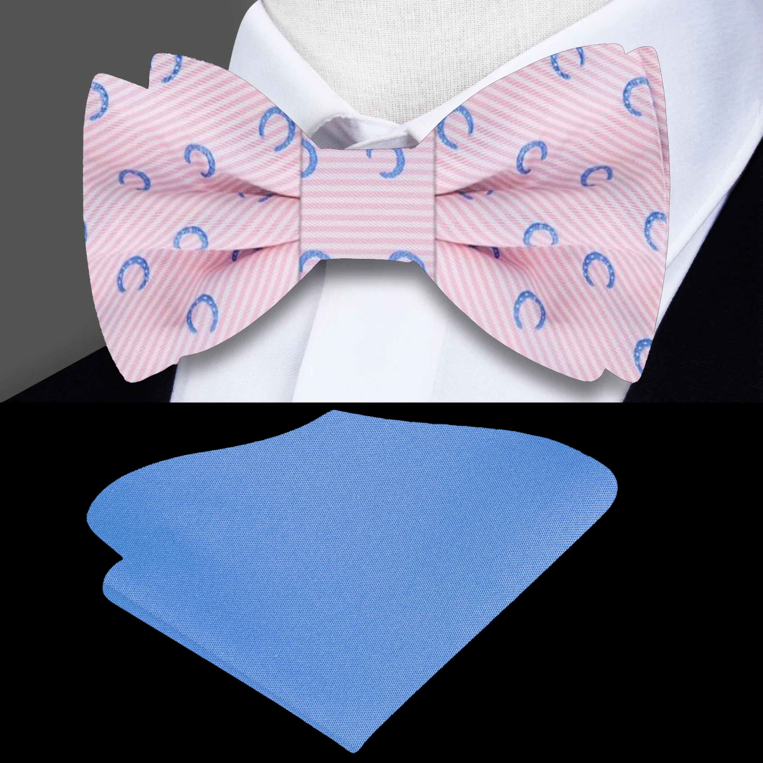 Light red silk bow tie with blue horseshoes pattern, perfect for derby day.