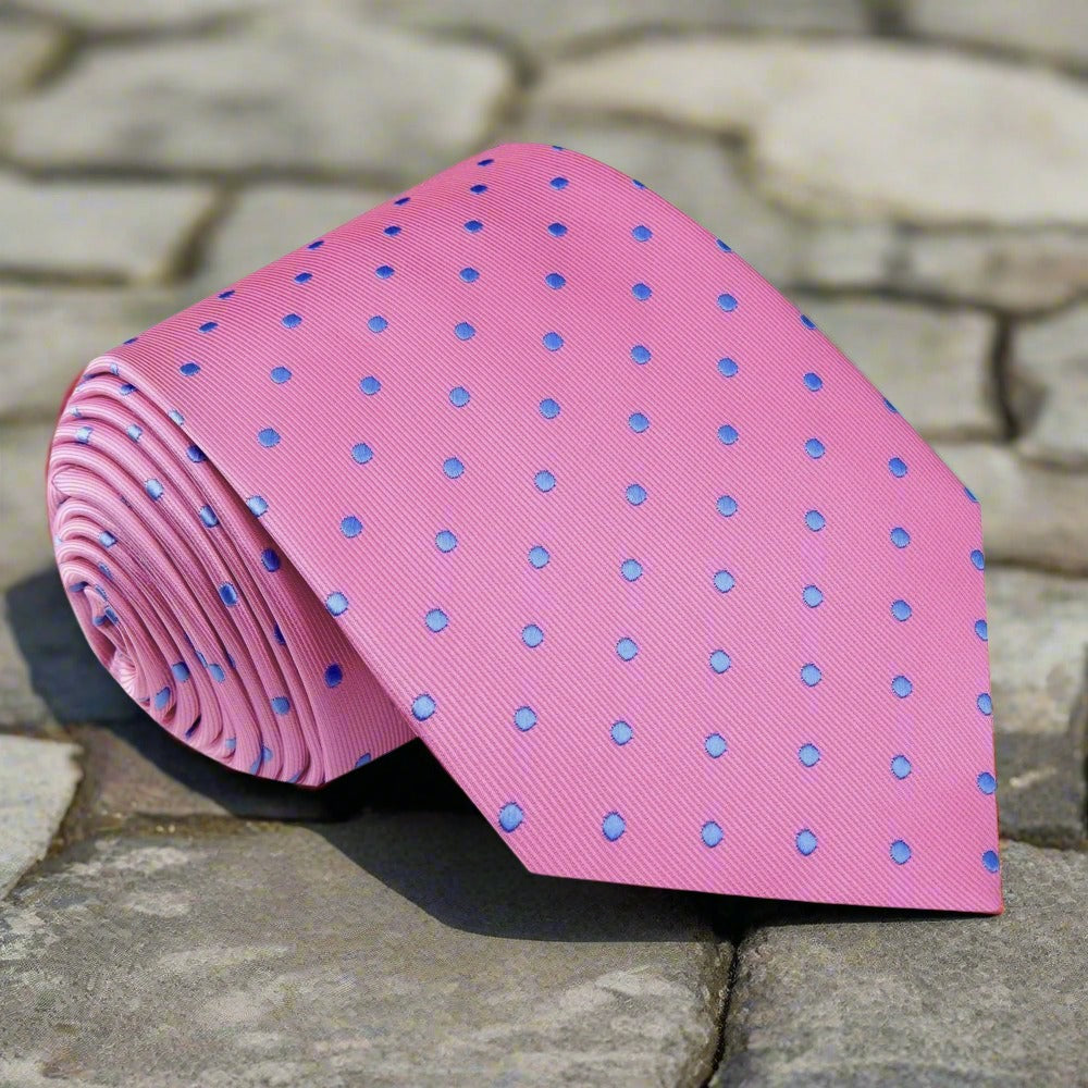 Close-up of green polka dot tie, showcasing its vibrant dots and silk texture.