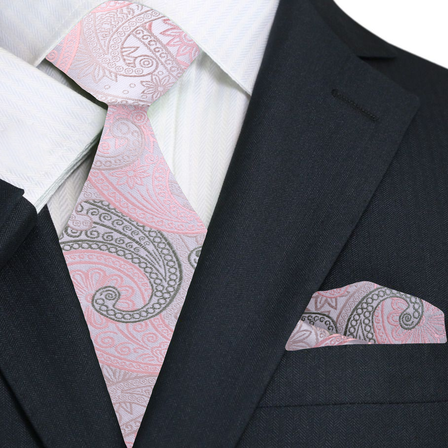Man wearing silk paisley tie with navy suit at a wedding