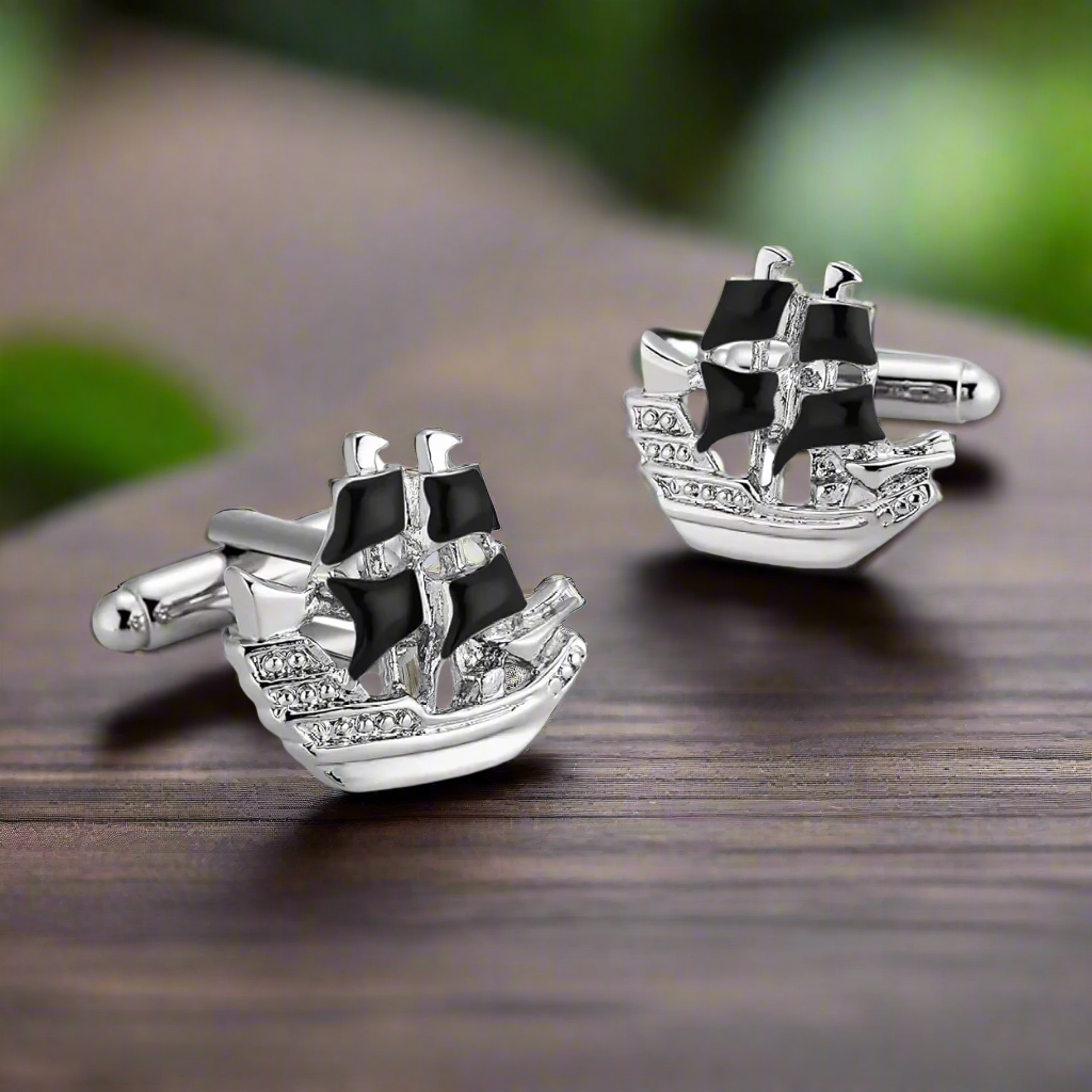 Detailed pirate ship cufflinks with chrome finish, ideal for themed parties