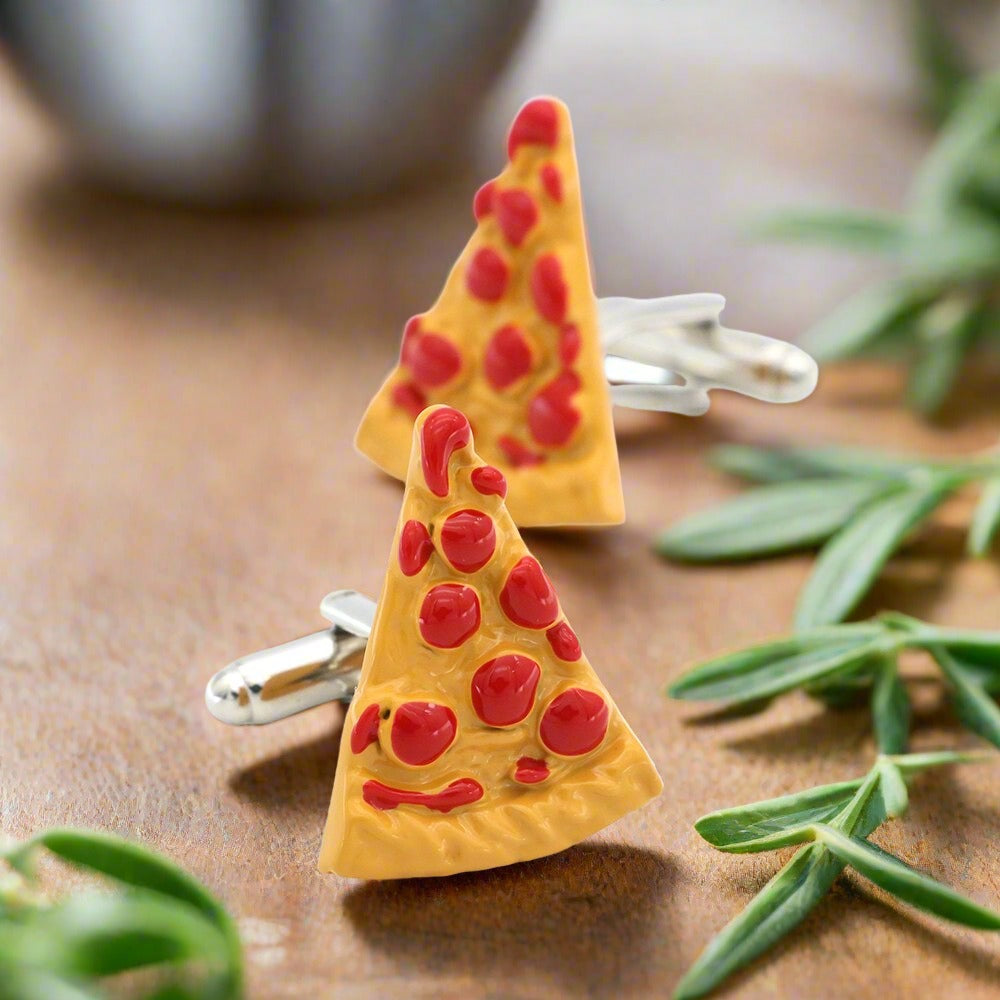 Close-up of fun pepperoni pizza cufflinks on a white shirt cuff