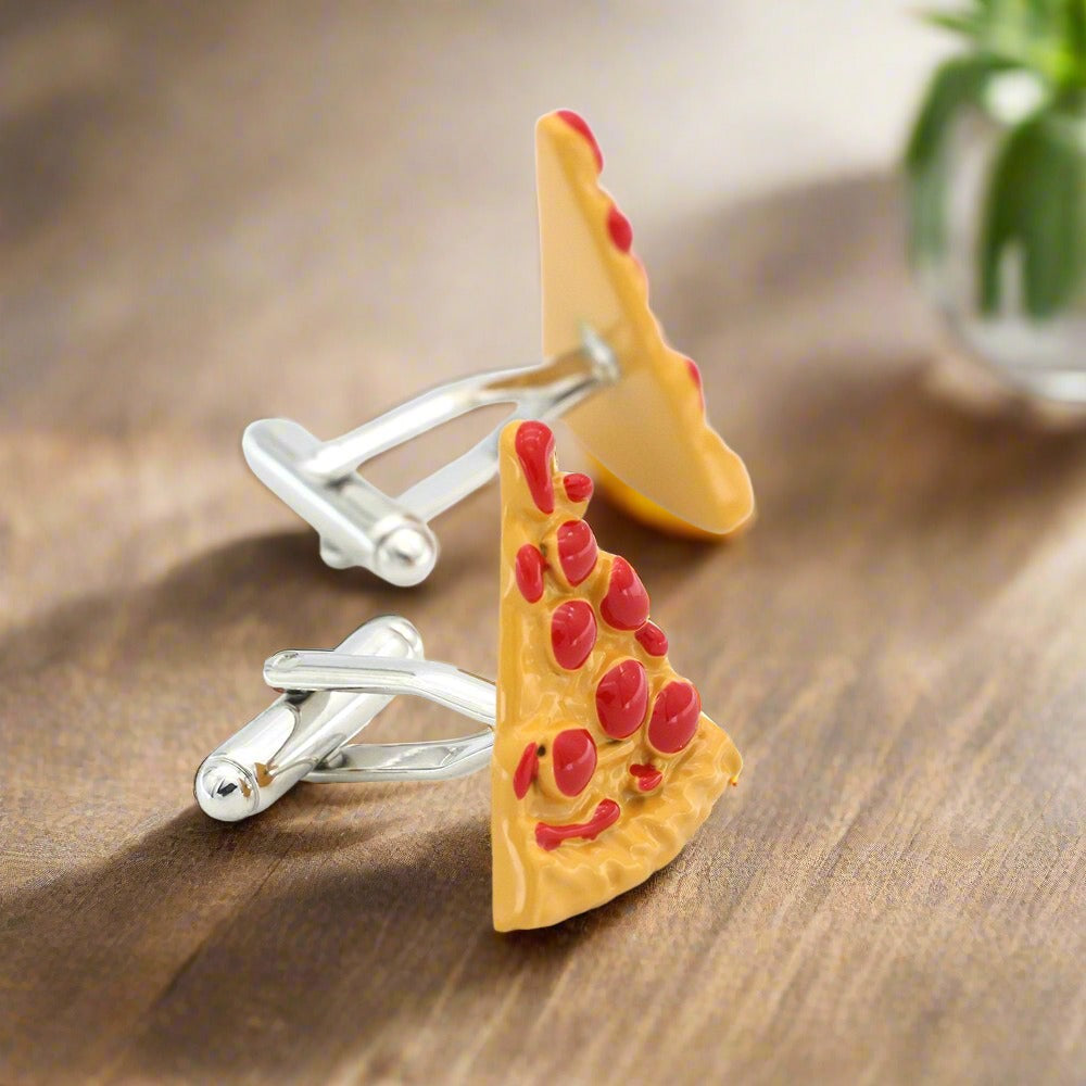 Man wearing pizza cufflinks at a casual party