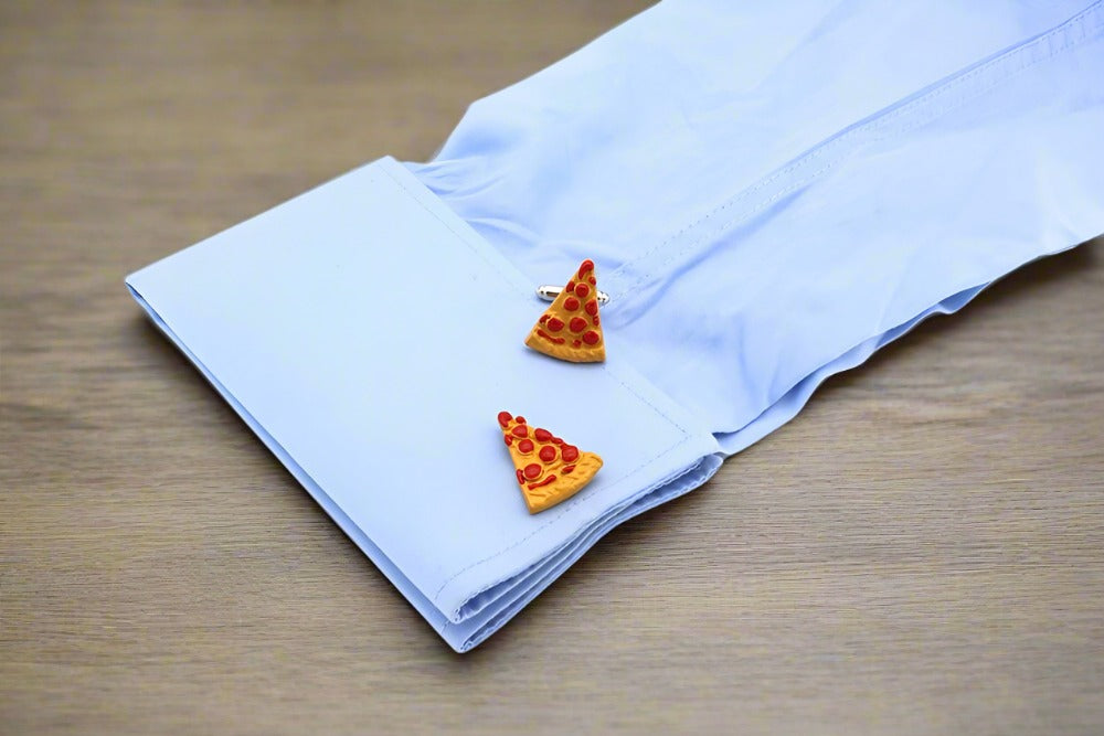 Colorful pizza slice cufflinks styled with a navy suit for casual events