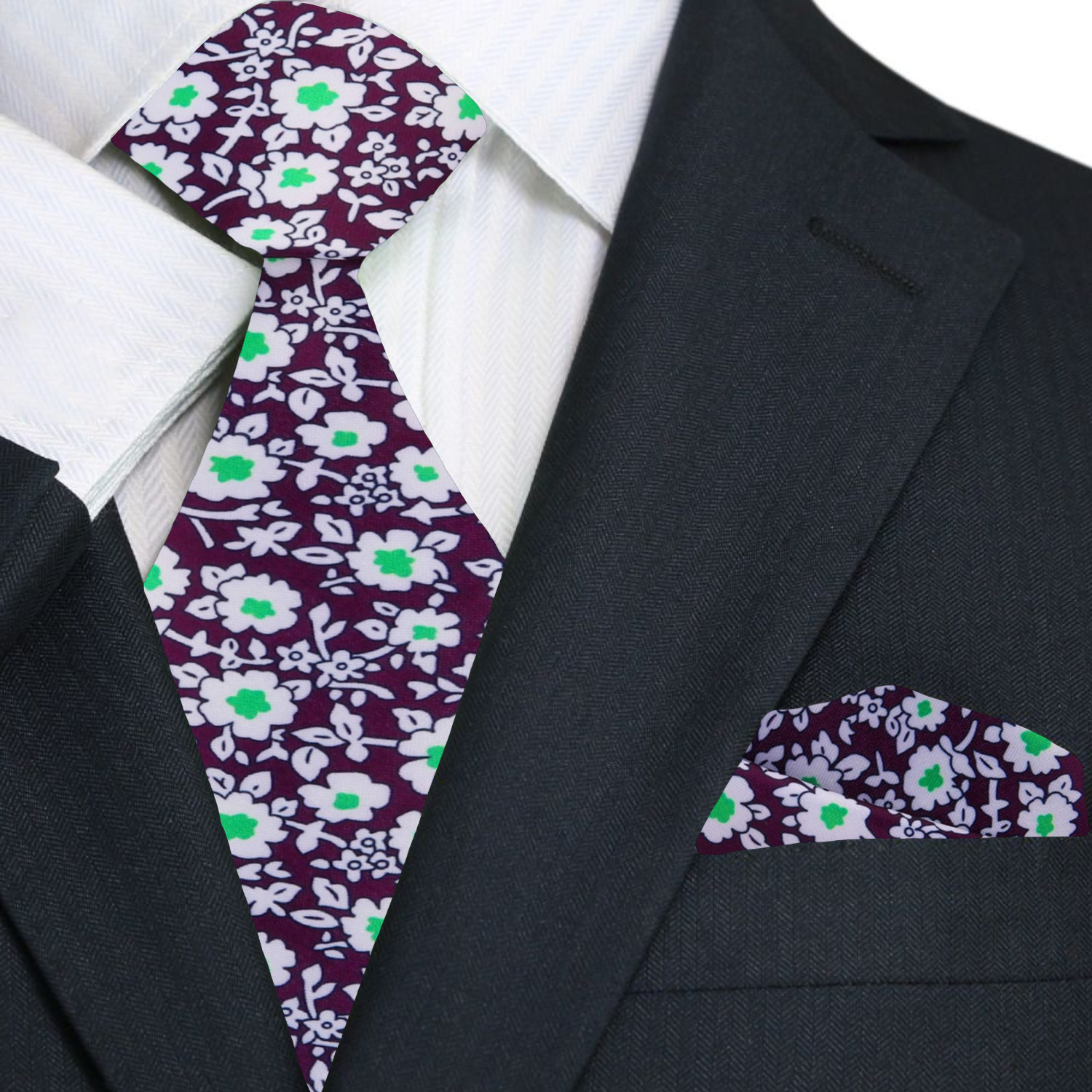 Close-up of plum silk tie with white and green floral pattern, ideal for weddings