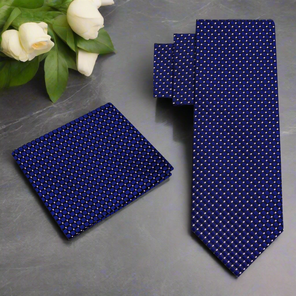Detail shot of the tie and matching pocket square set, highlighting the modern design suitable for weddings and corporate events.