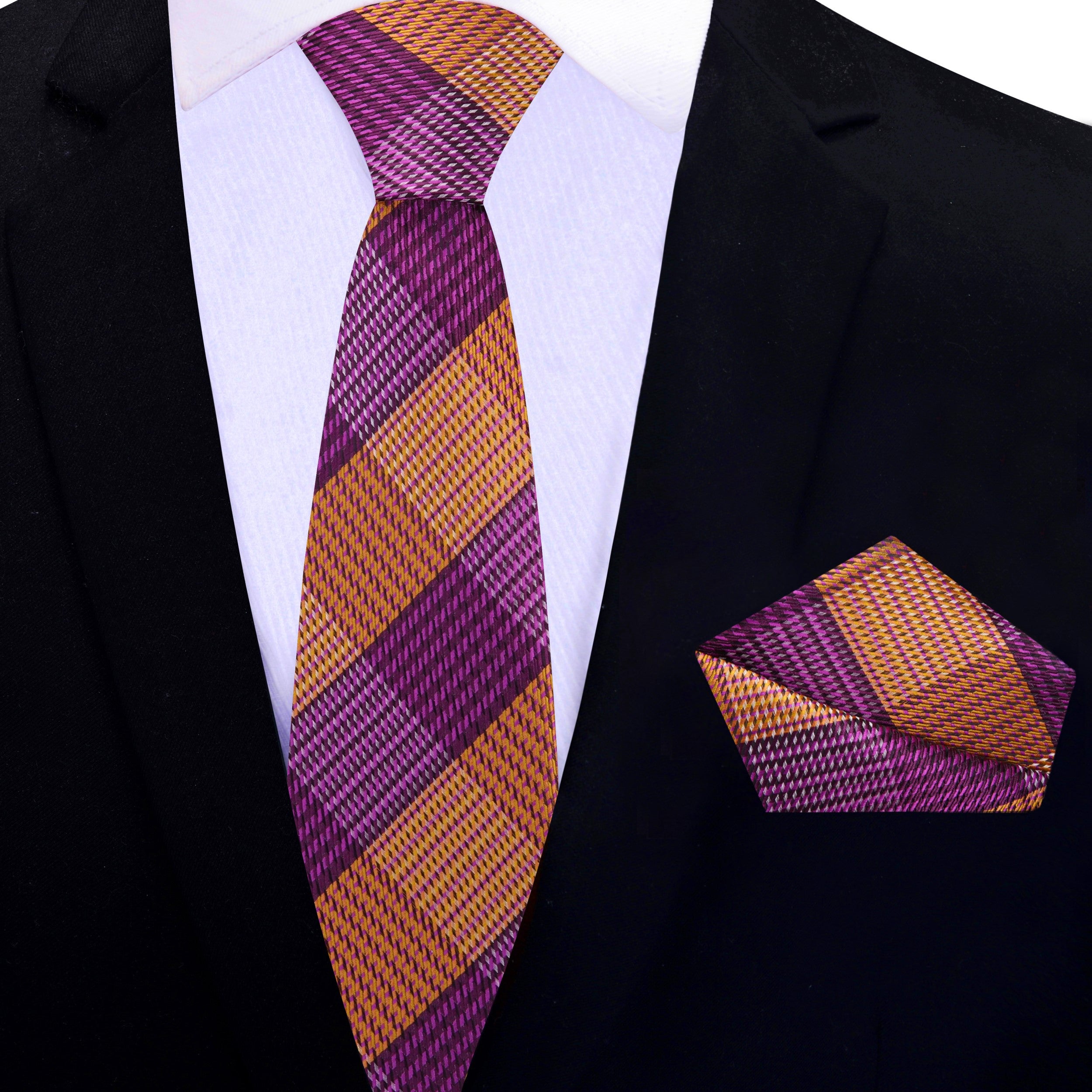 Silk plaid tie and pocket square set displayed on a stylish dress shirt