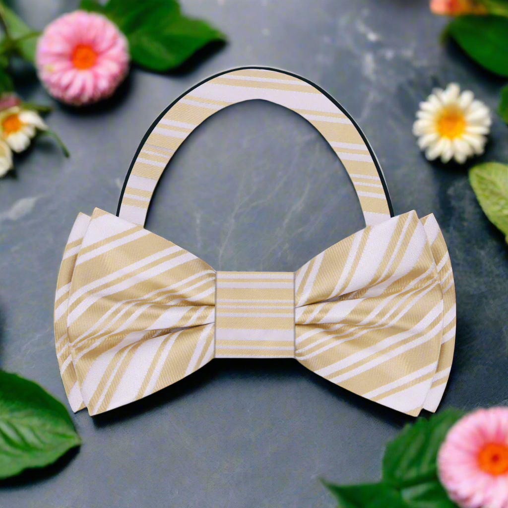Ivory bow tie styled with a tan suit, showcasing its refined look.