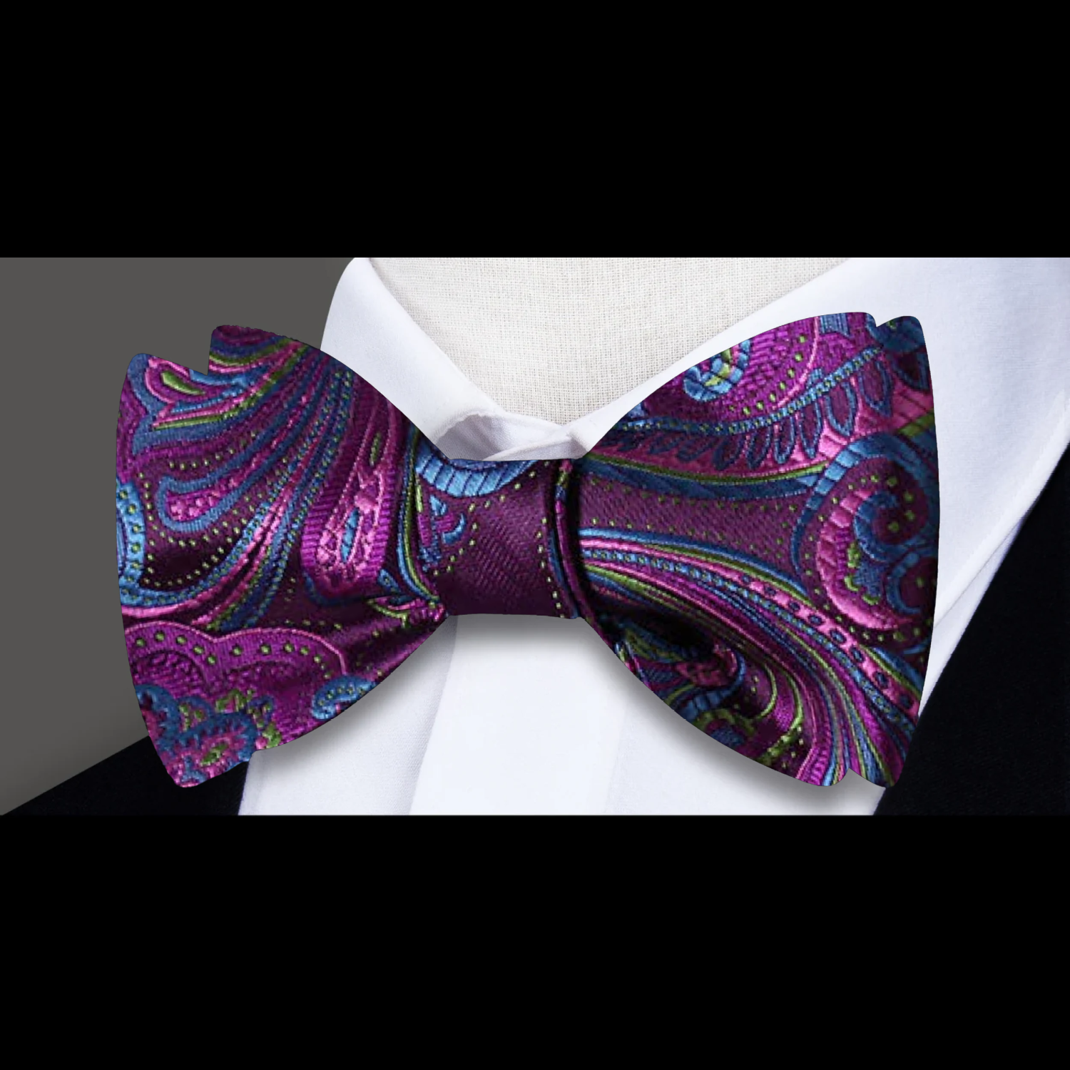 Styled with a white dress shirt and navy suit for a formal wedding occasion