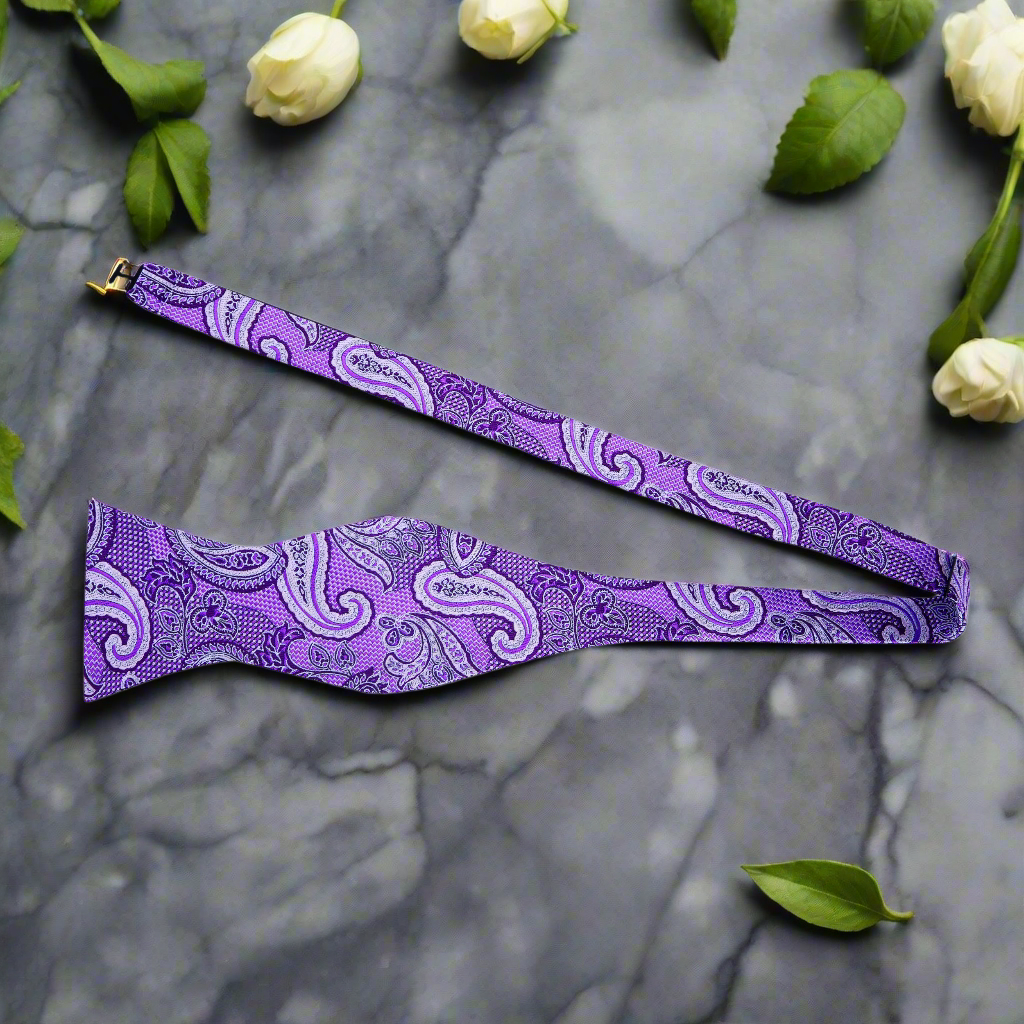 Close-up of the detailed paisley pattern on a high-quality bow tie