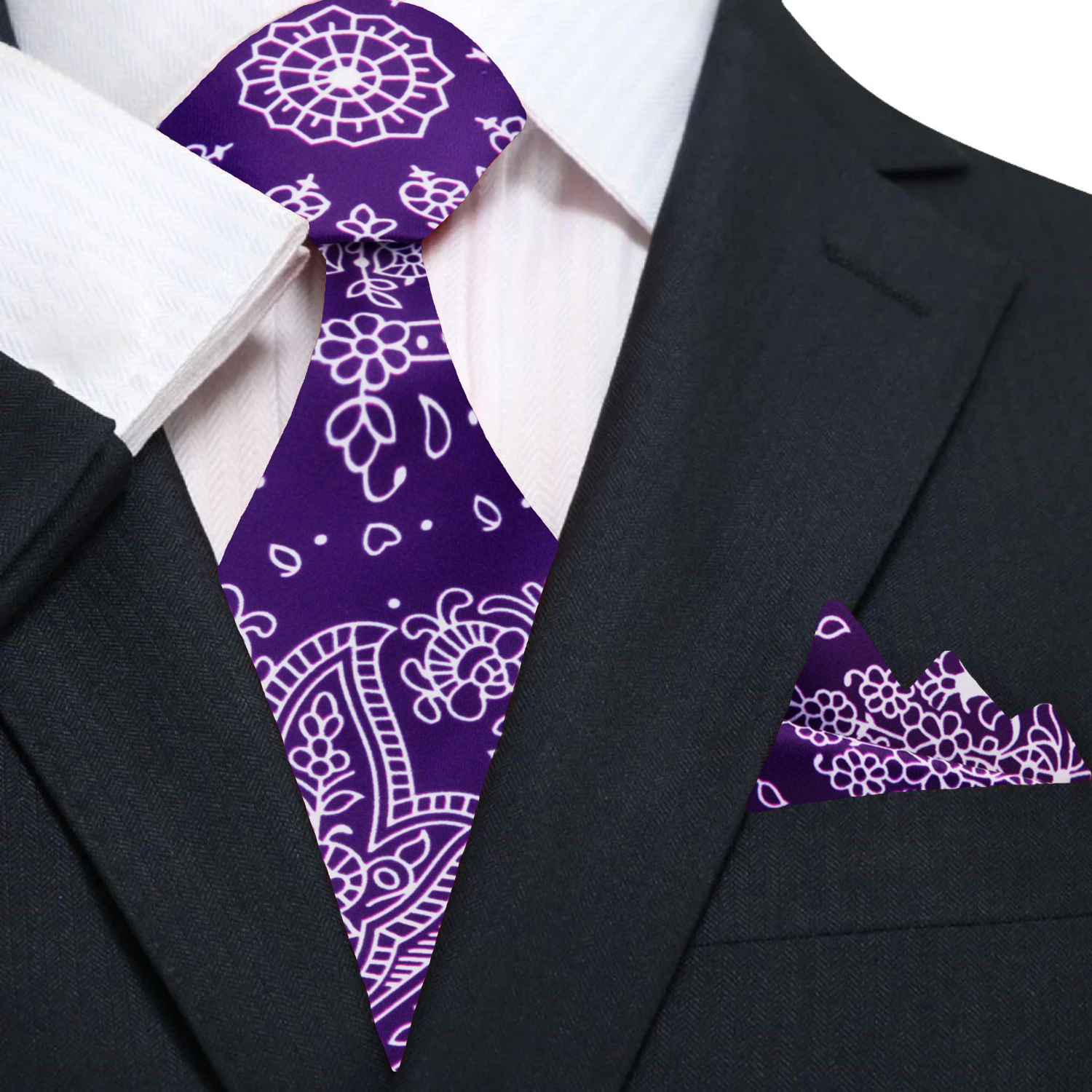 Close-up of the red paisley silk necktie showcasing its intricate bandana pattern.