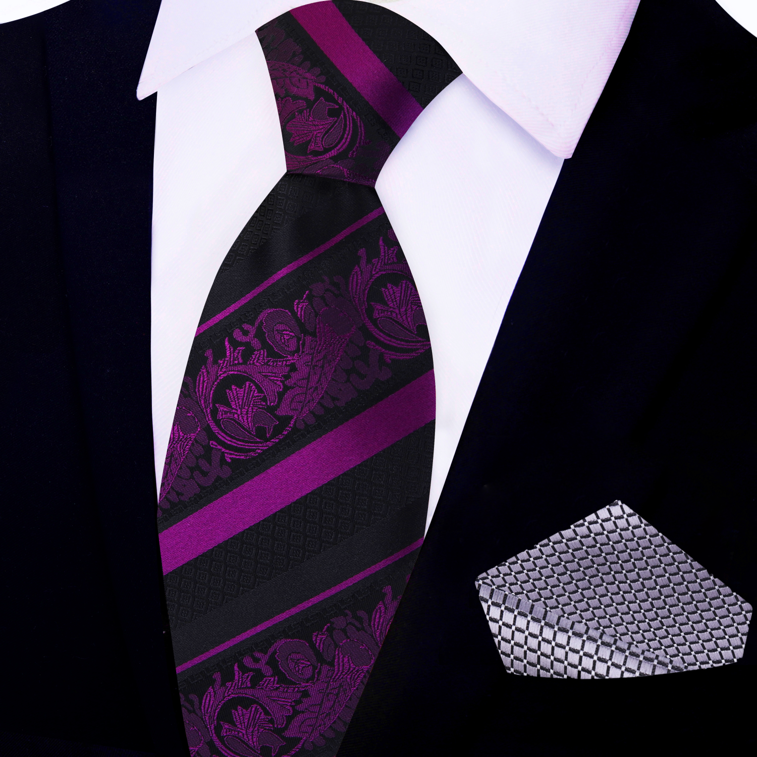 Close-up of the detailed paisley pattern on the silk tie for formal occasions