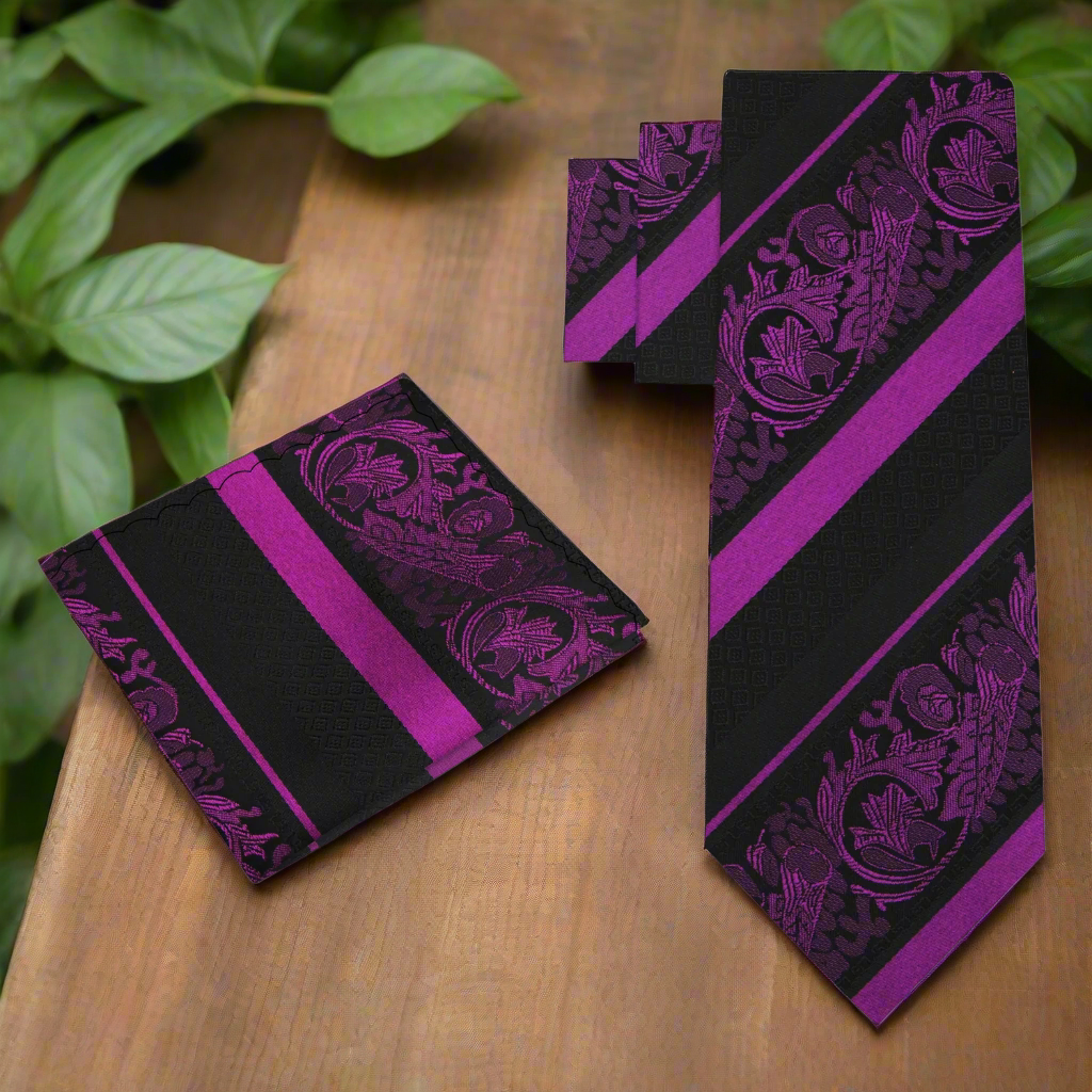 Elegant black and purple paisley silk necktie hanging on a tie rack