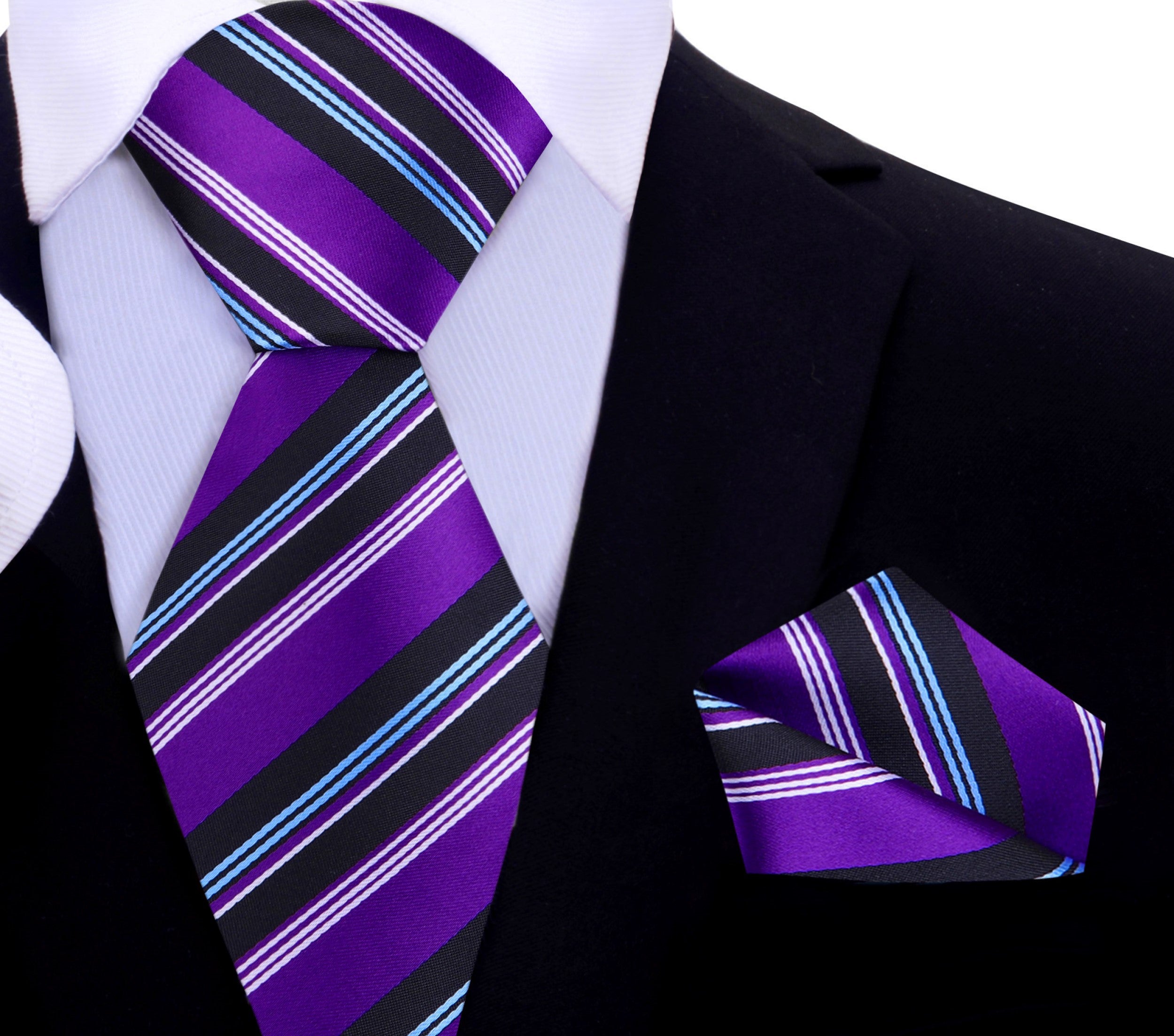 Vibrant striped silk necktie worn with a white dress shirt and navy suit