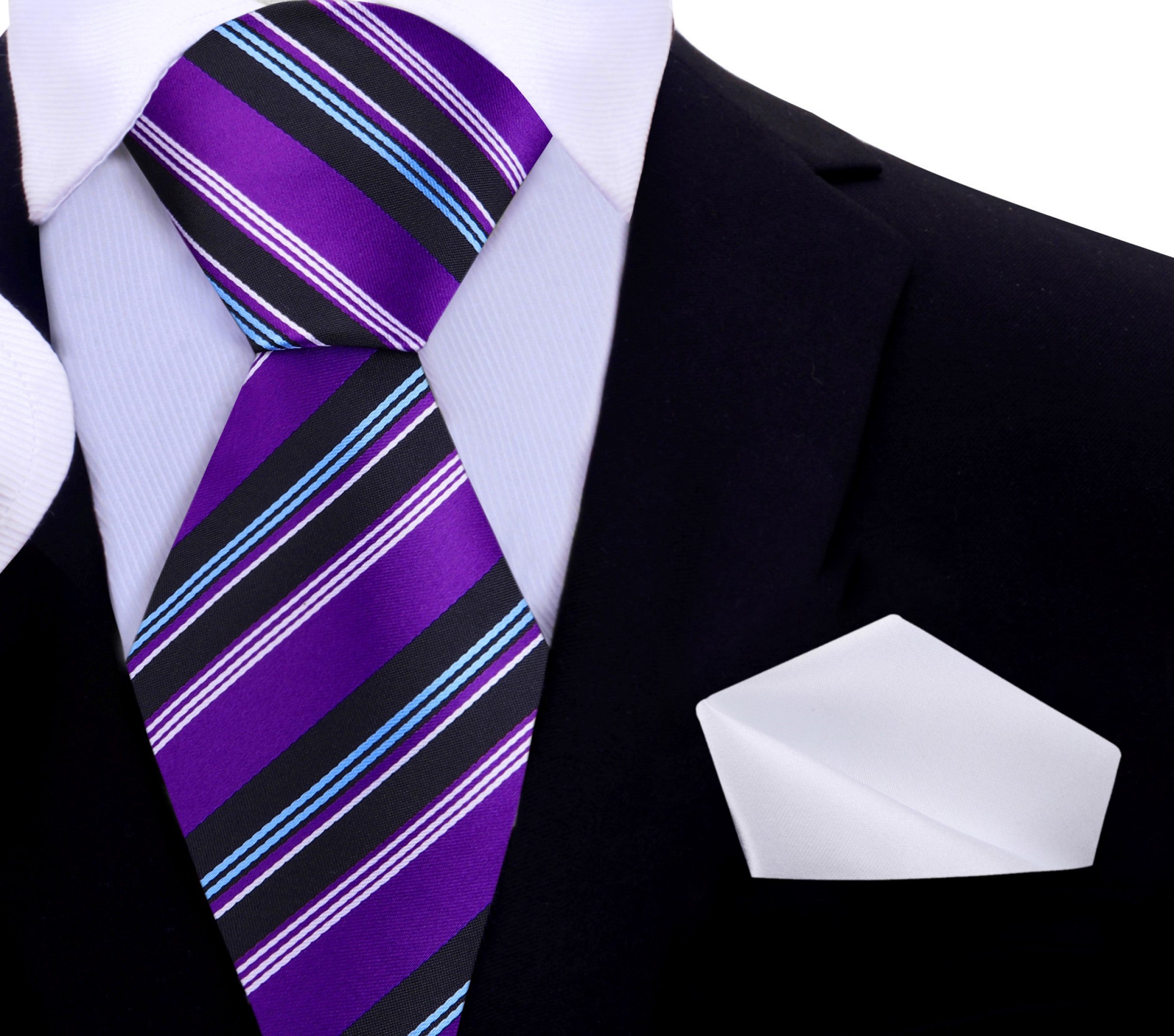 Man adjusting a silk necktie with bold stripe pattern for a wedding or business event