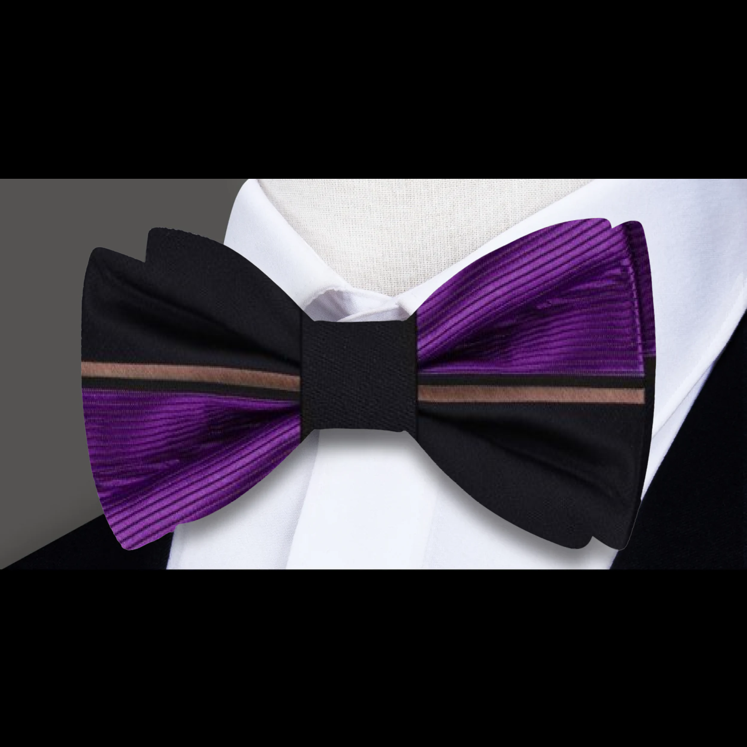 Model wearing the bow tie with a black pinstripe suit at a formal event