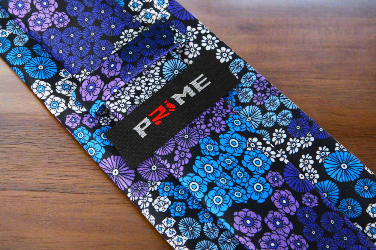 Styled outfit featuring a floral silk tie for spring wedding attire