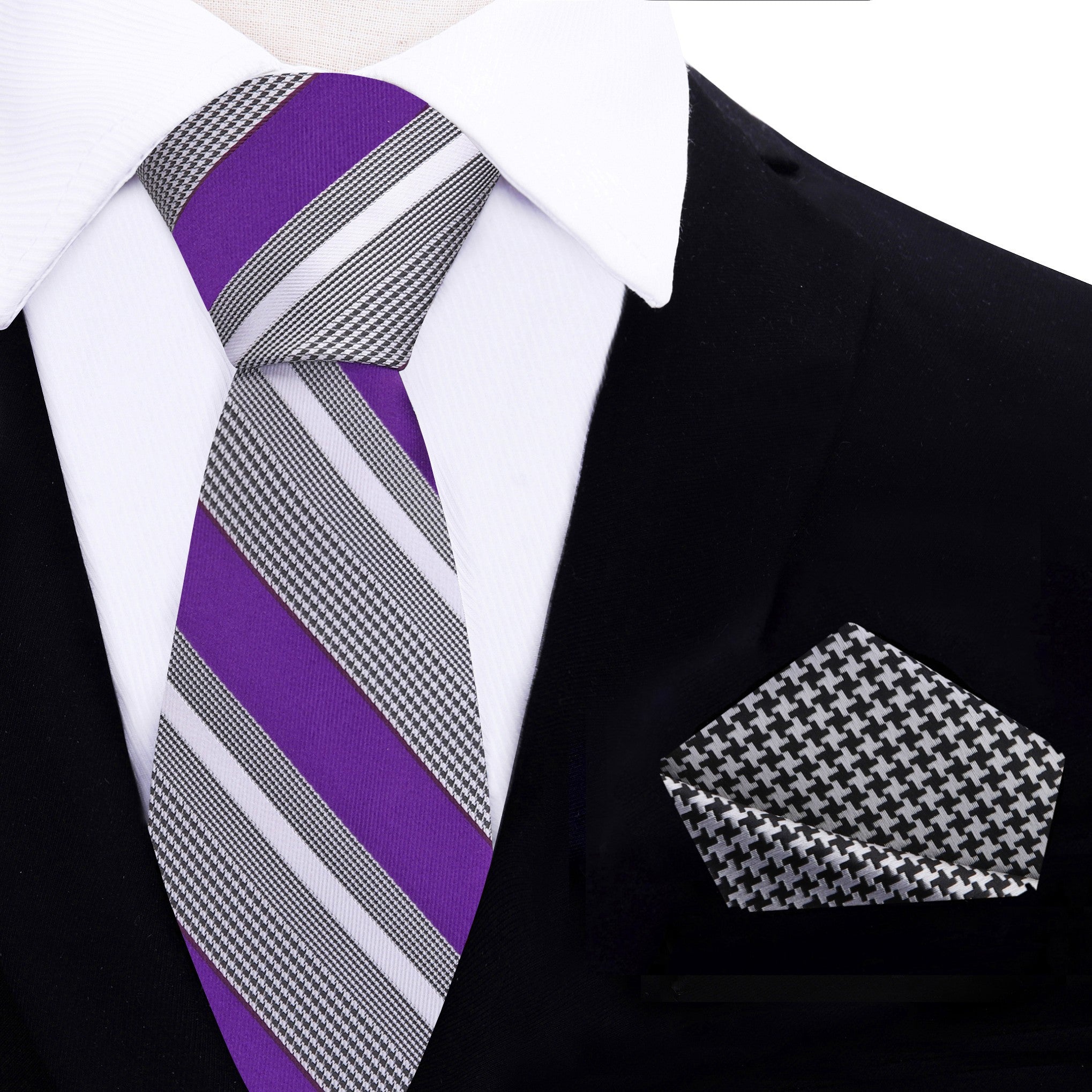 Front view of the purple striped necktie showcasing the houndstooth pattern.