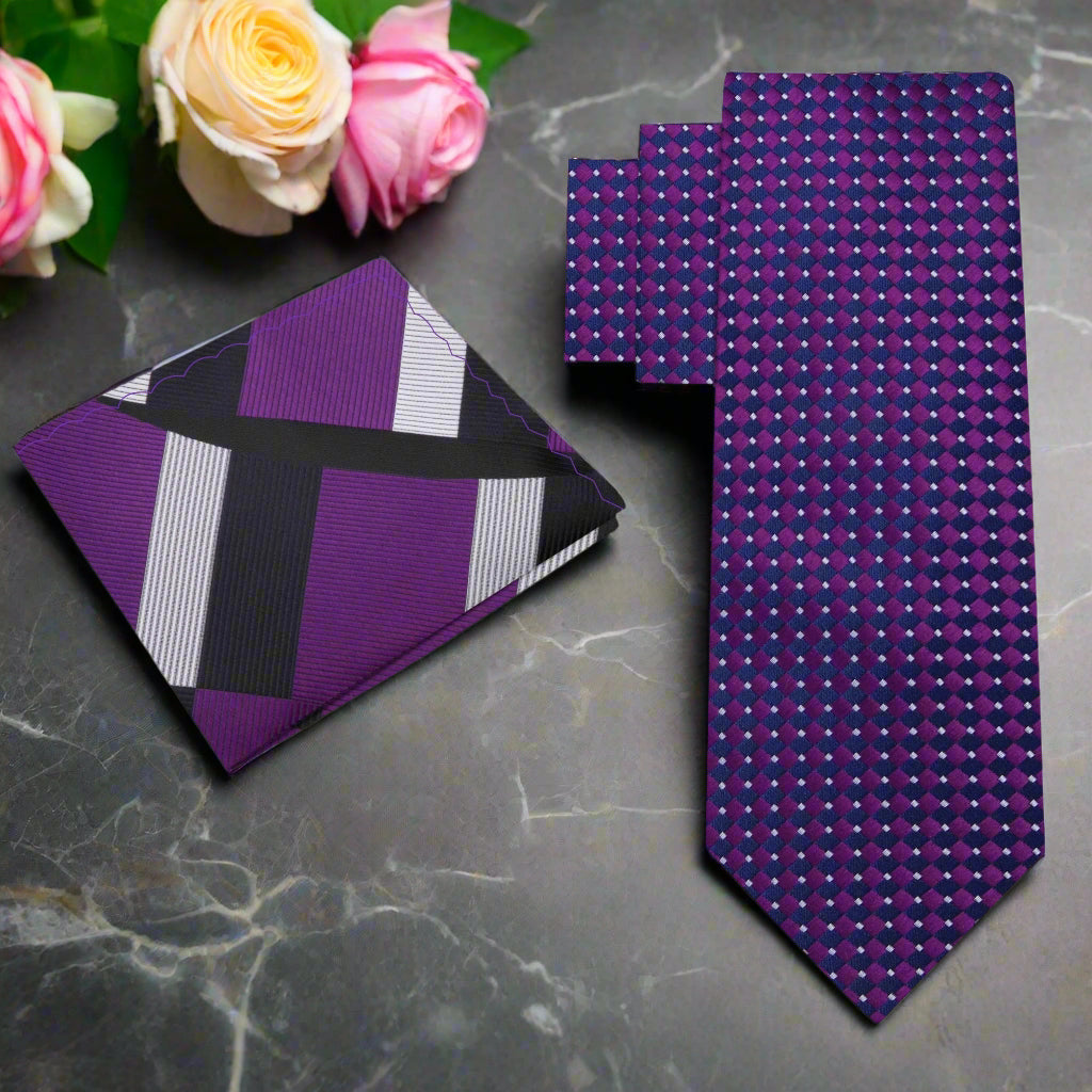Elegant deep purple geometric silk tie on a white dress shirt, highlighting its bold design.