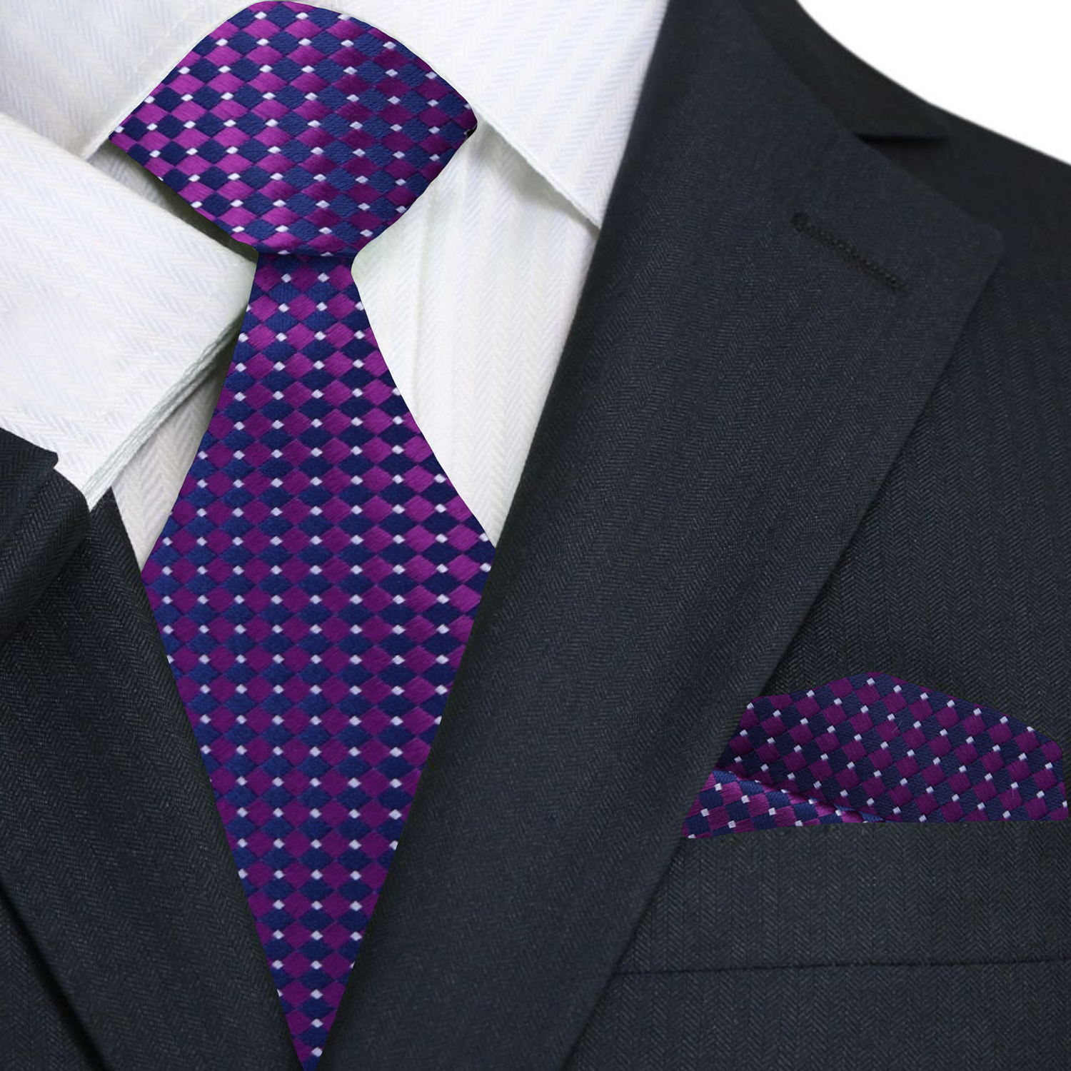 Silk tie displayed against a light grey dress shirt, showcasing its modern geometric pattern.