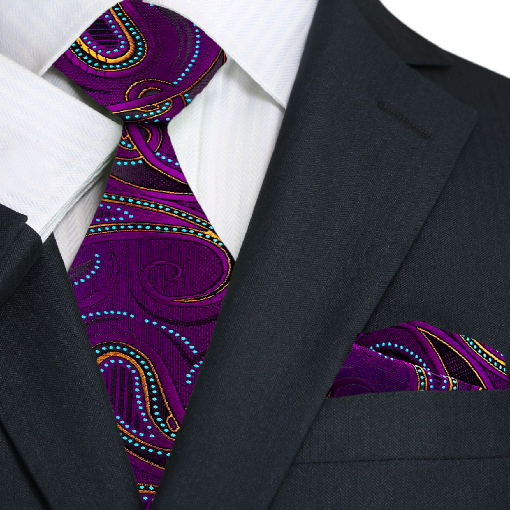 Model wearing a paisley silk tie with gold pattern paired with a white dress shirt