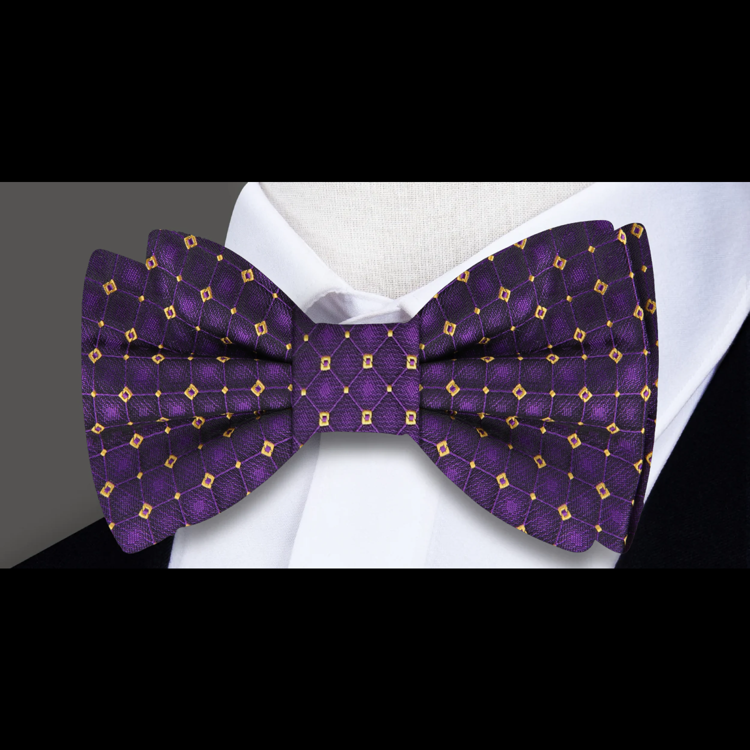 Model wearing the purple geometric bow tie at a black-tie event, complemented by a classic white shirt.