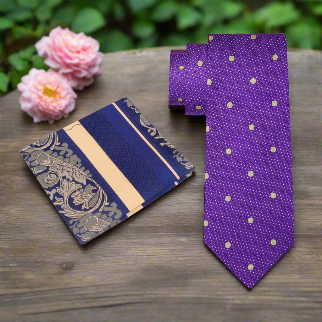 Elegant purple tie with gold polka dots displayed on a hanger for formal events