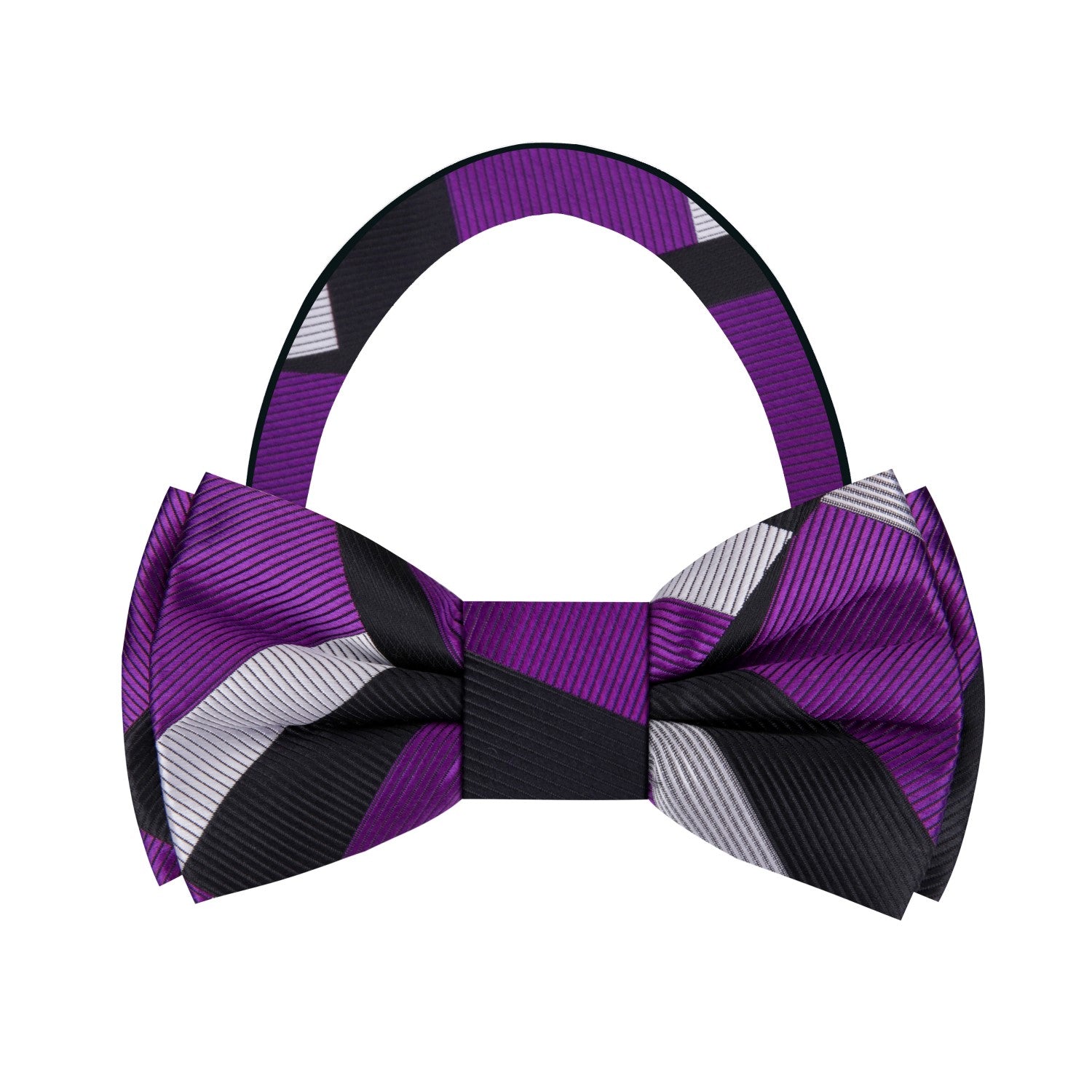 Child wearing kids formal bow tie with matching pocket square at a wedding event