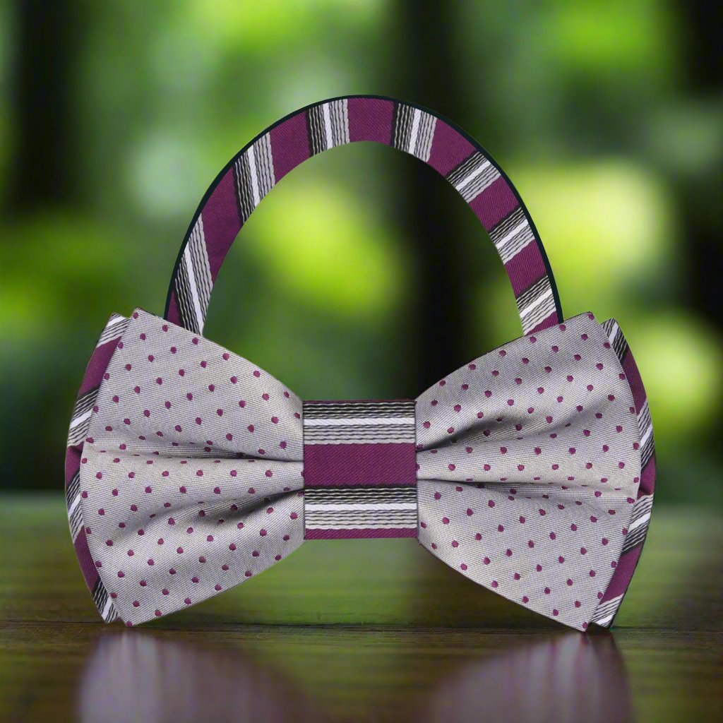 Man wearing double-sided silk bow tie with suit for a wedding or corporate event