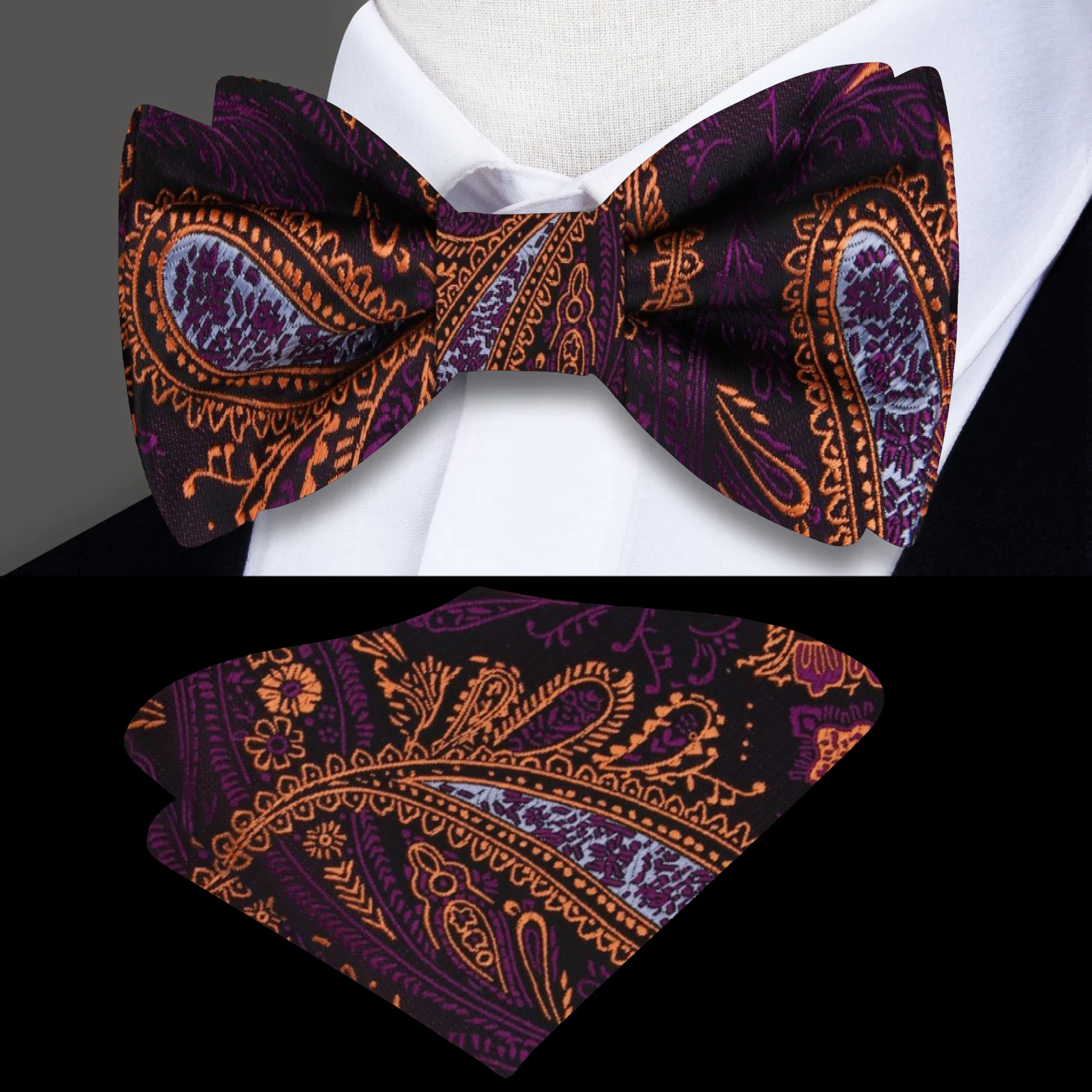 Model wearing the Royal Elegance paisley bow tie with a light grey dress shirt and charcoal suit.