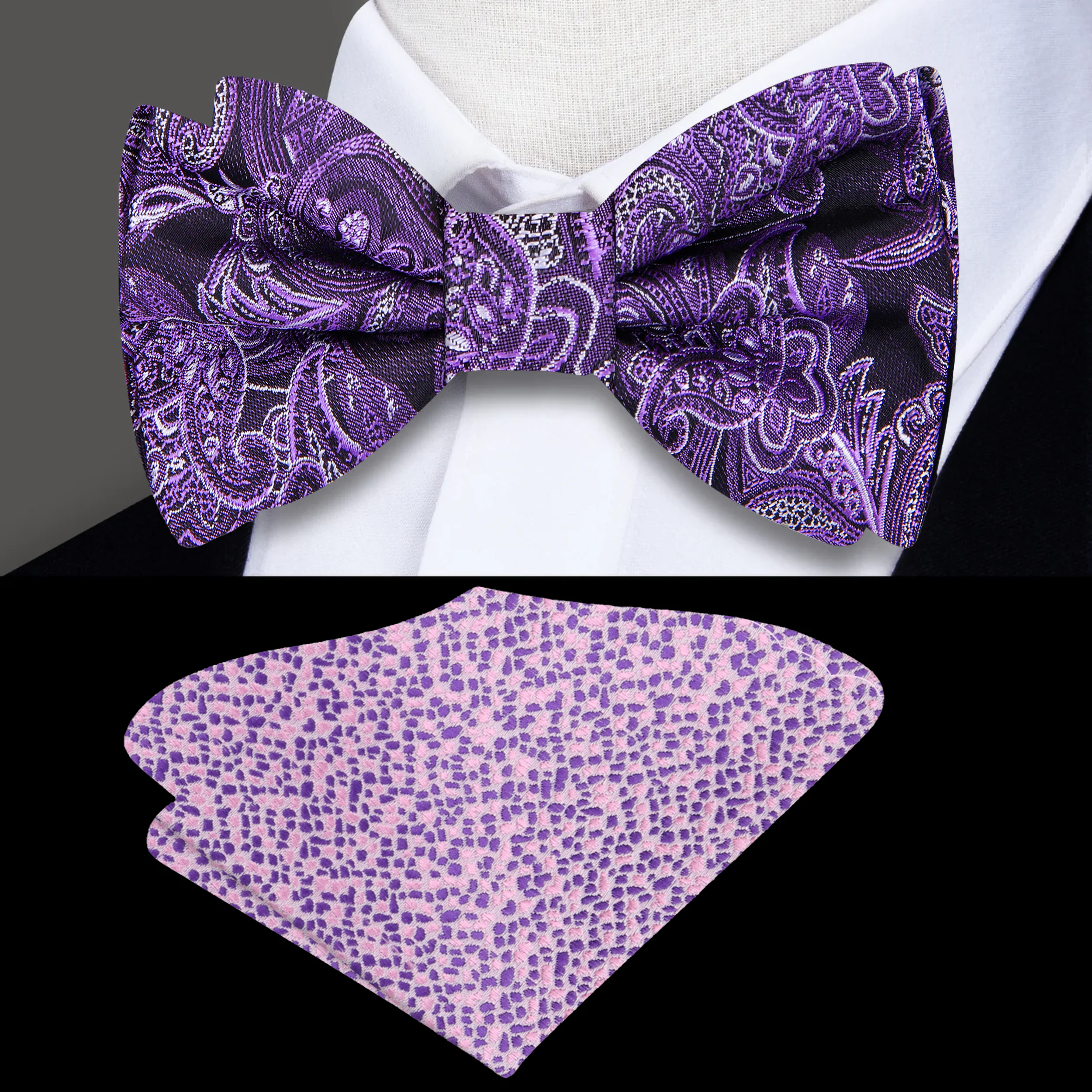 Close-up of a purple paisley silk self tie bow tie on a white dress shirt