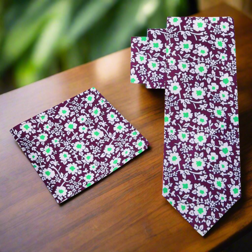 Mens floral silk necktie styled with a charcoal suit and white shirt for office wear