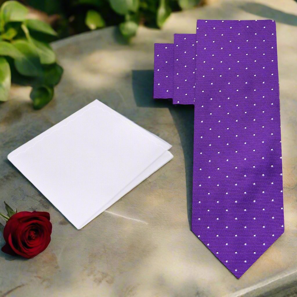 Man wearing a polka dot necktie with a matching pocket square, suited for weddings