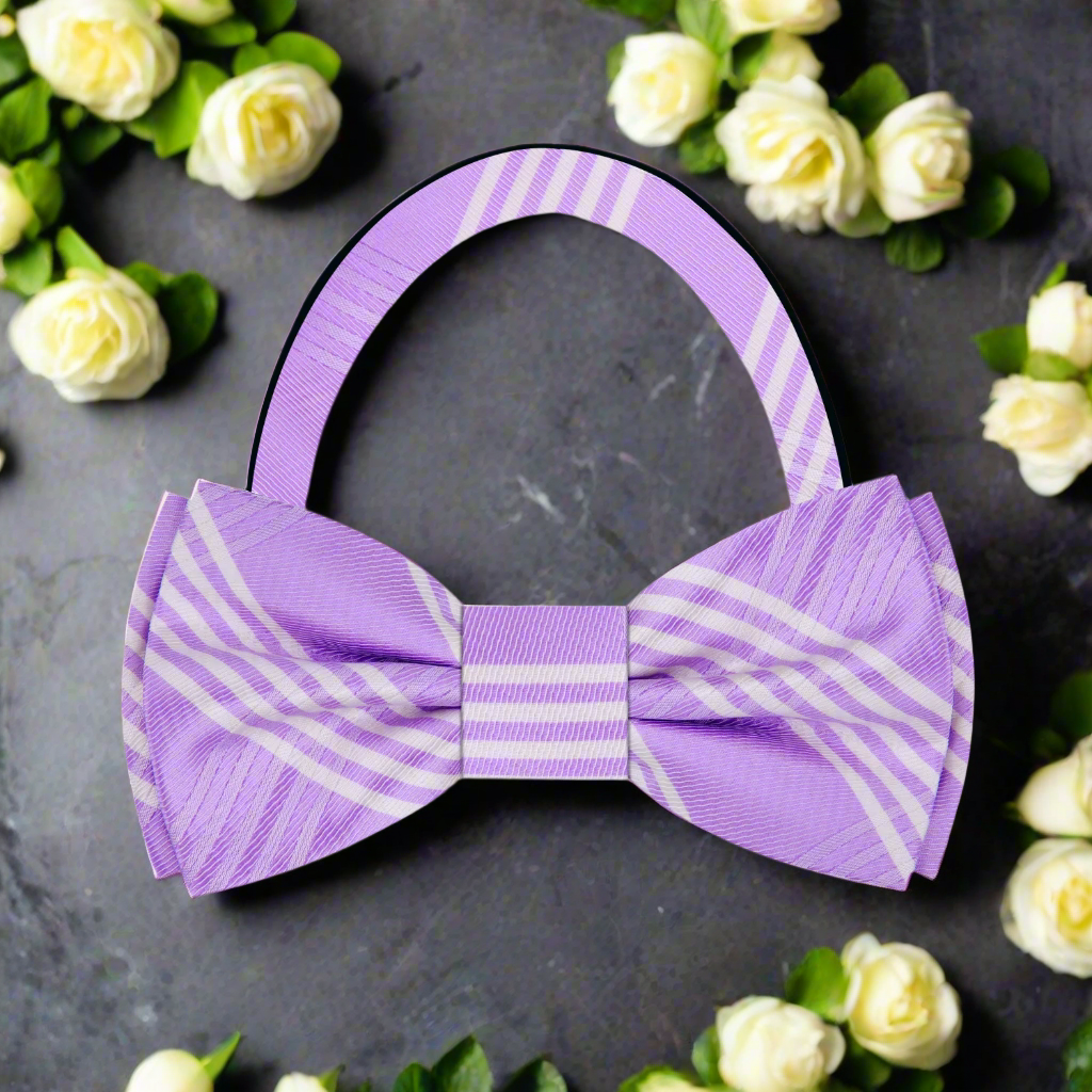 Elegant light purple plaid silk bow tie, showcased on a crisp white shirt.