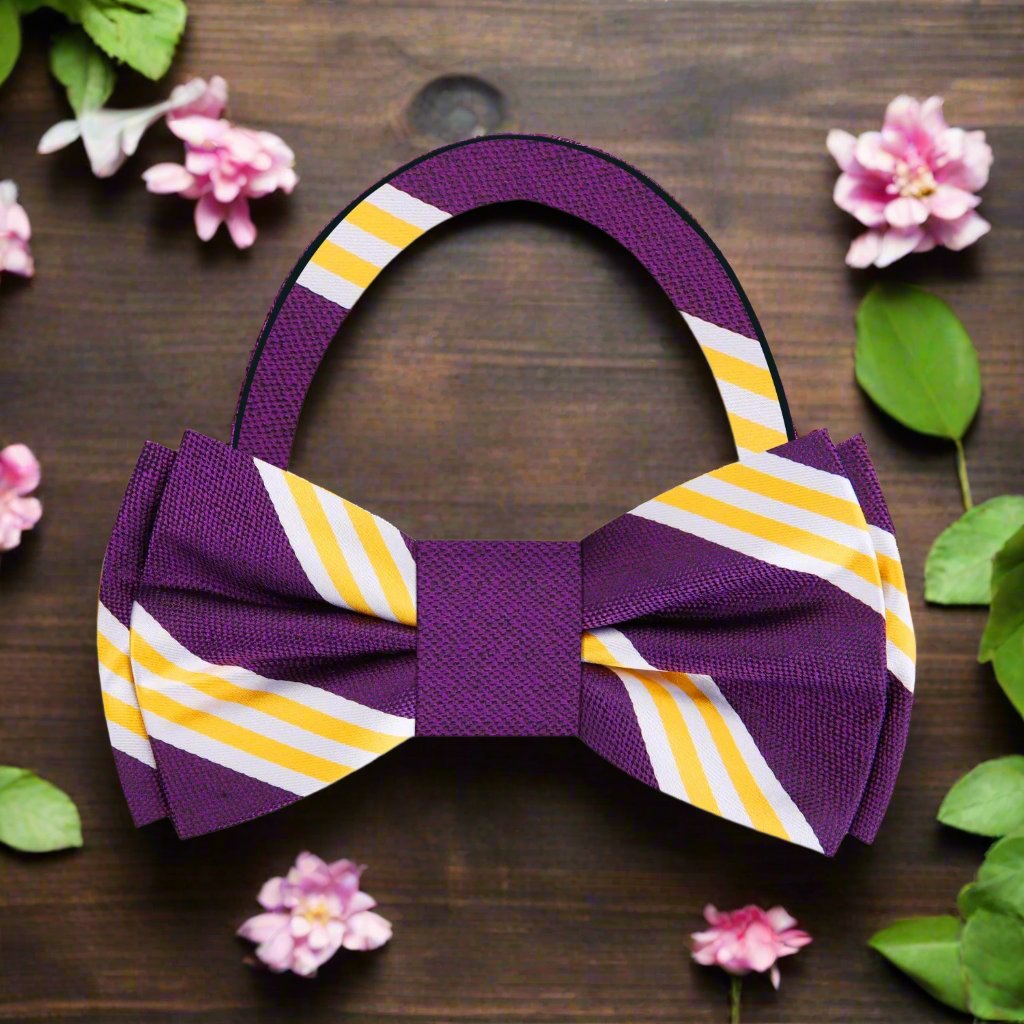 Silk striped bow tie paired with a crisp white dress shirt