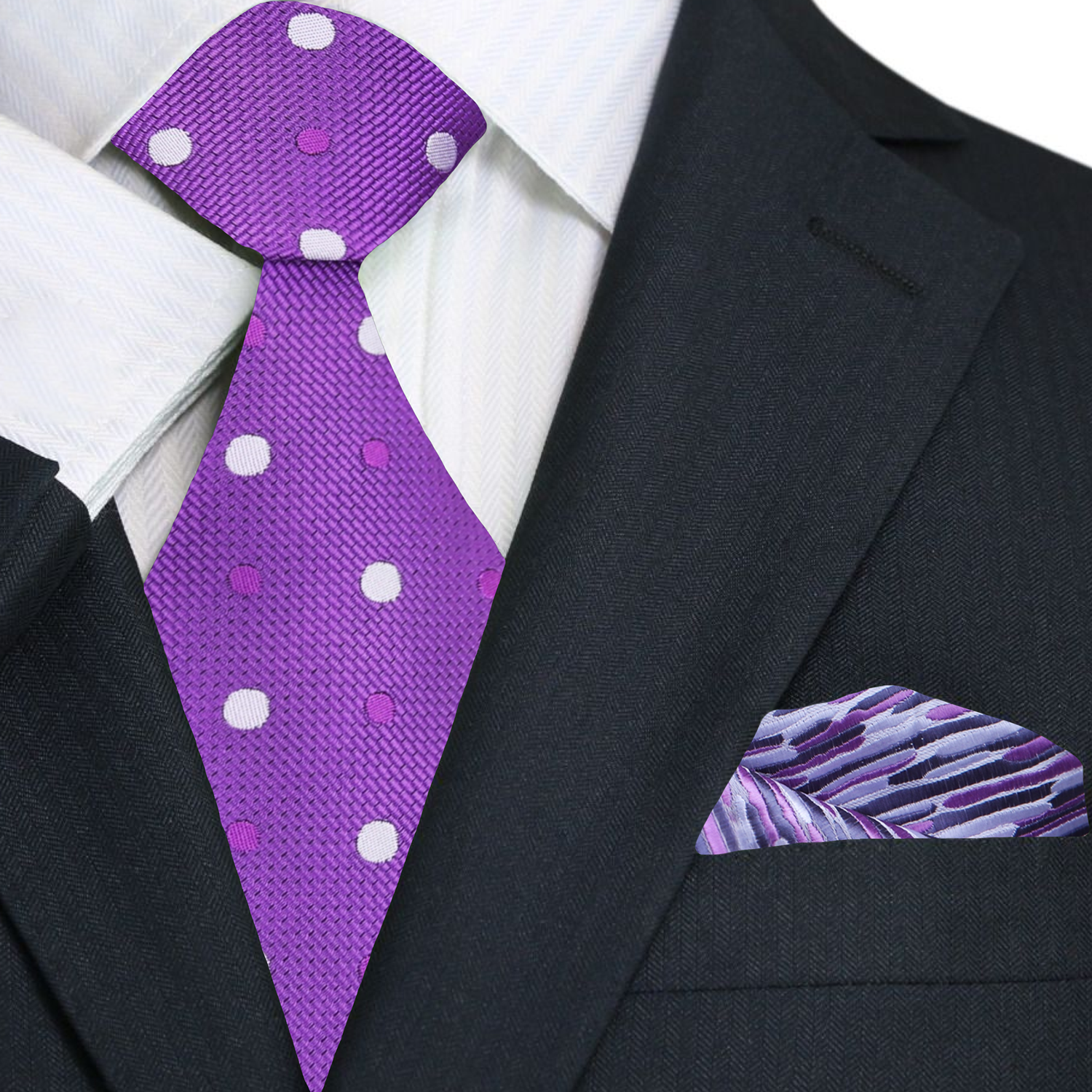 Stylish man wearing a grey polka dot tie at a wedding, highlighting the ties elegant design.