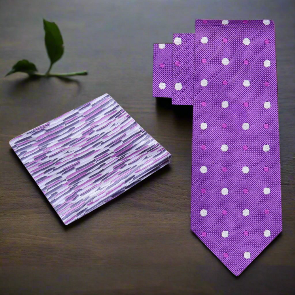 A neatly arranged grey polka dot necktie with matching pocket square, perfect for office wear.