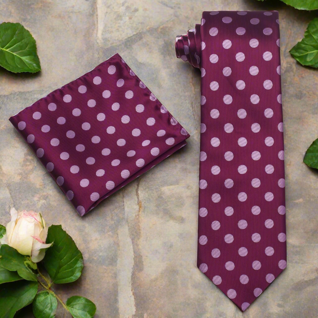 Man wearing stylish raspberry tie for summer garden party