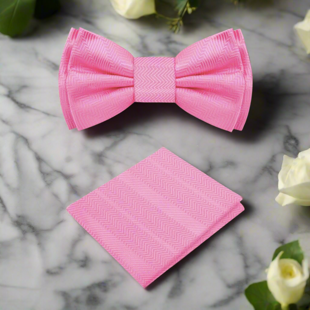 Close-up of a silk solid color bow tie with lined texture detail