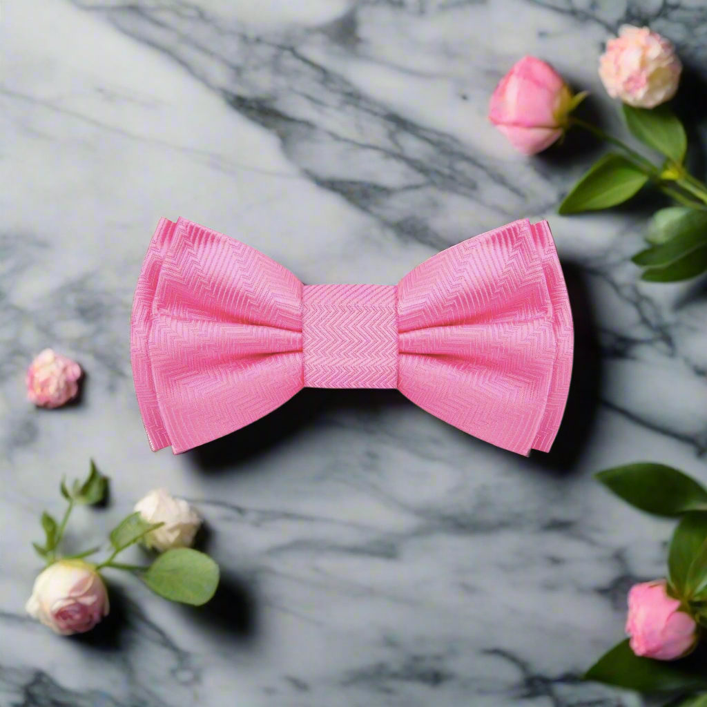 Elegant pink and purple lined texture bow tie worn with a white dress shirt