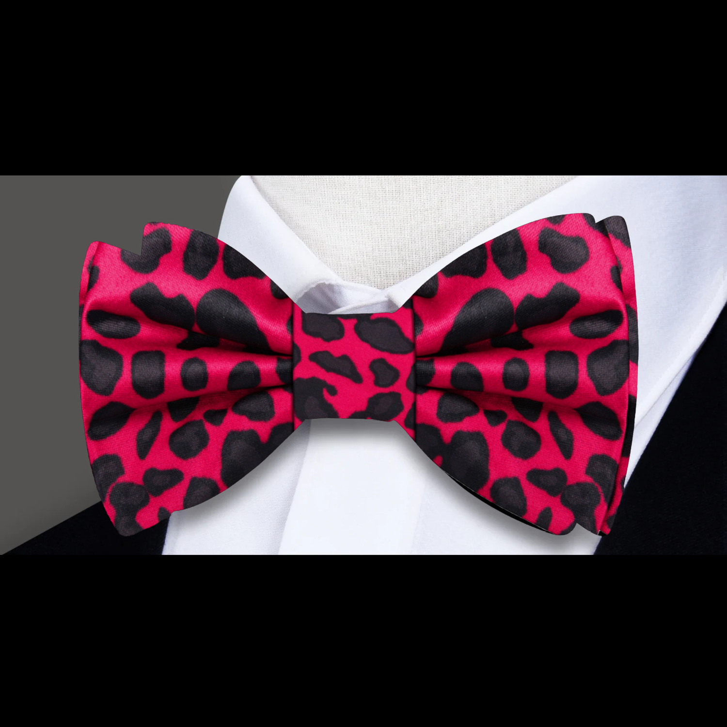 Elegant cheetah pattern silk bow tie styled with a dress shirt for formal events