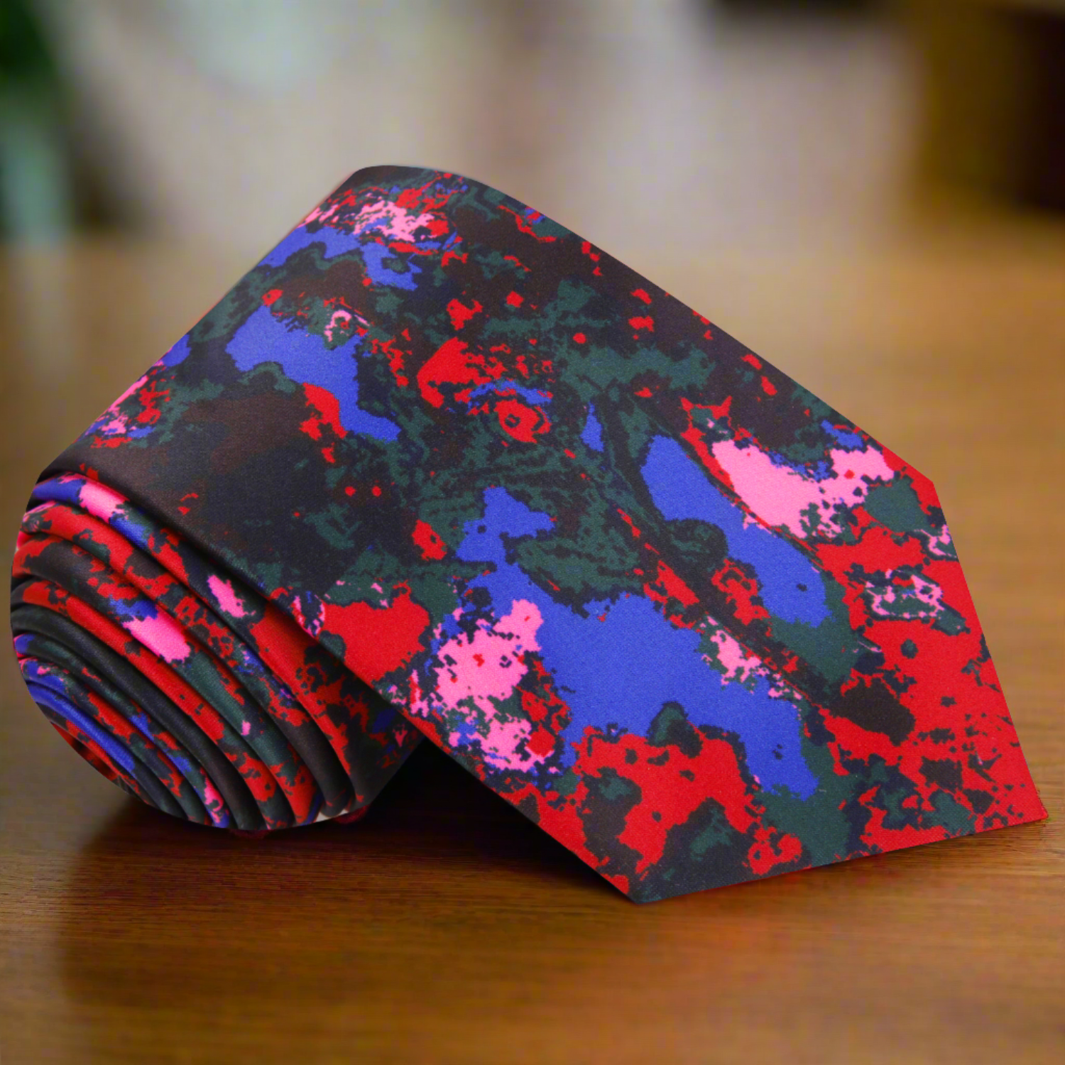 Close-up of the Watercolor Symphony silk necktie showcasing its vibrant colors.