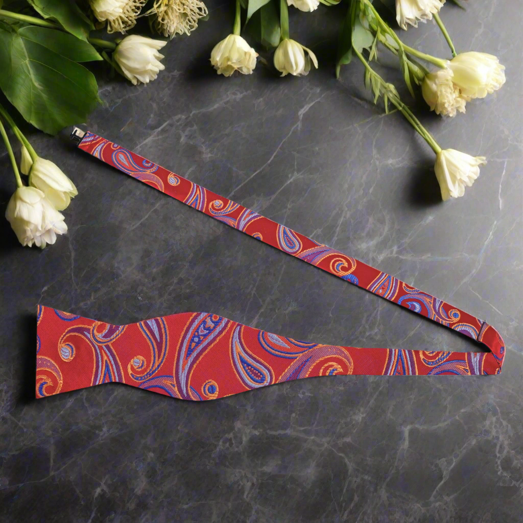 Front view of the Evington paisley self-tie bow tie showcasing its intricate design.