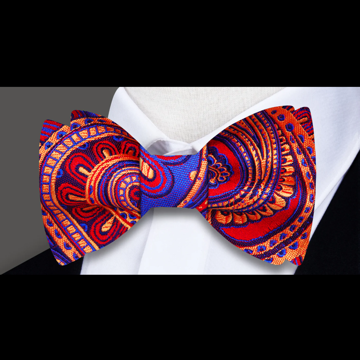 Fashionable mens silk bow tie styled with a suit for a wedding