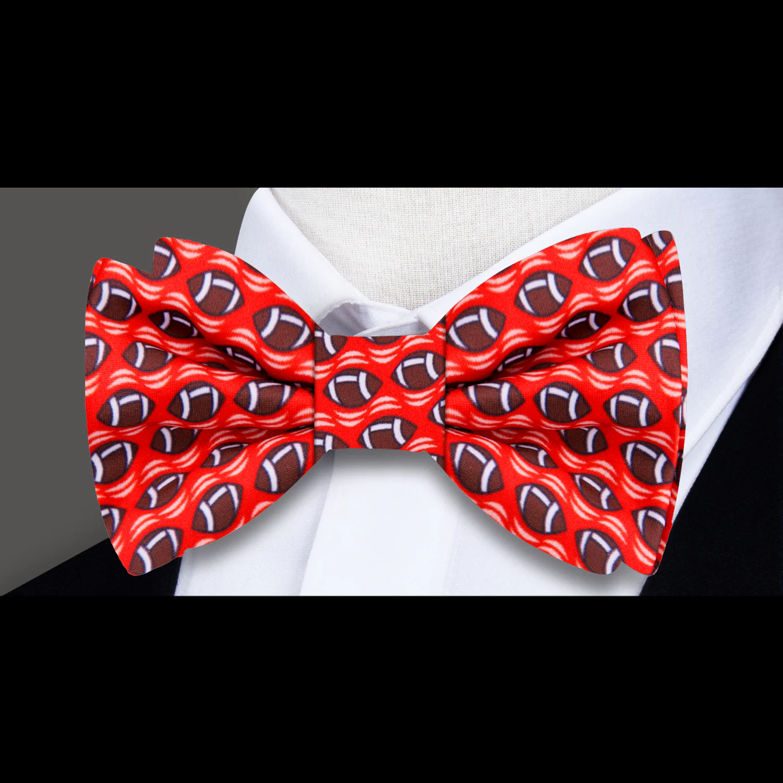 Close-up of a stylish football bow tie worn at a sports event