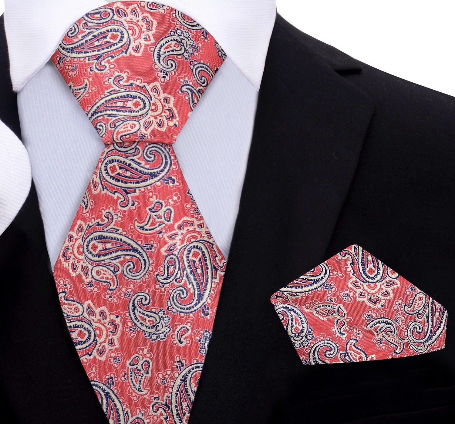 Fashionable paisley tie styled with navy suit for formal occasions