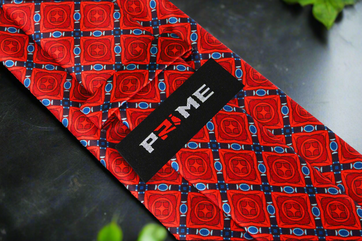 Man wearing the silk tie with a navy suit at a wedding