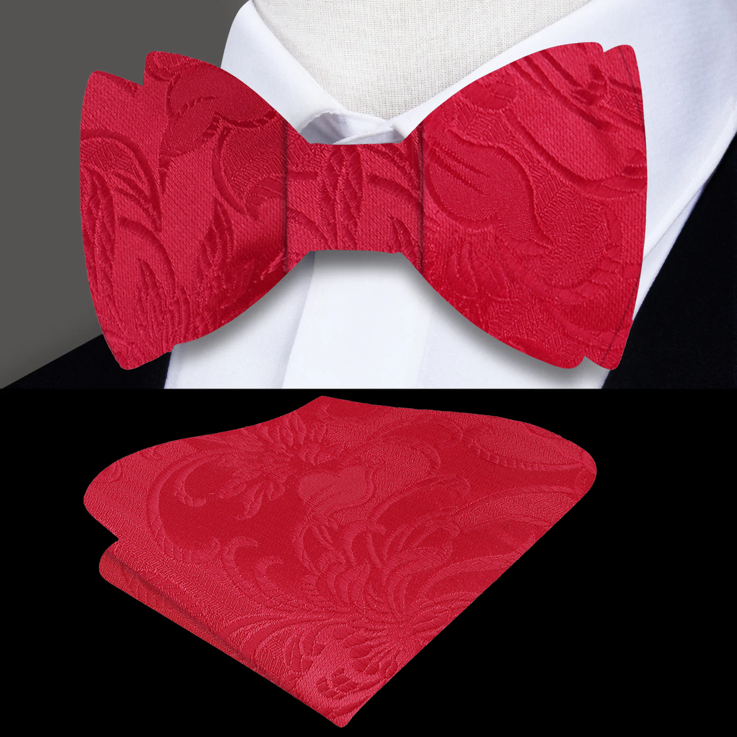 Model wearing a blue paisley silk bow tie paired with a navy suit