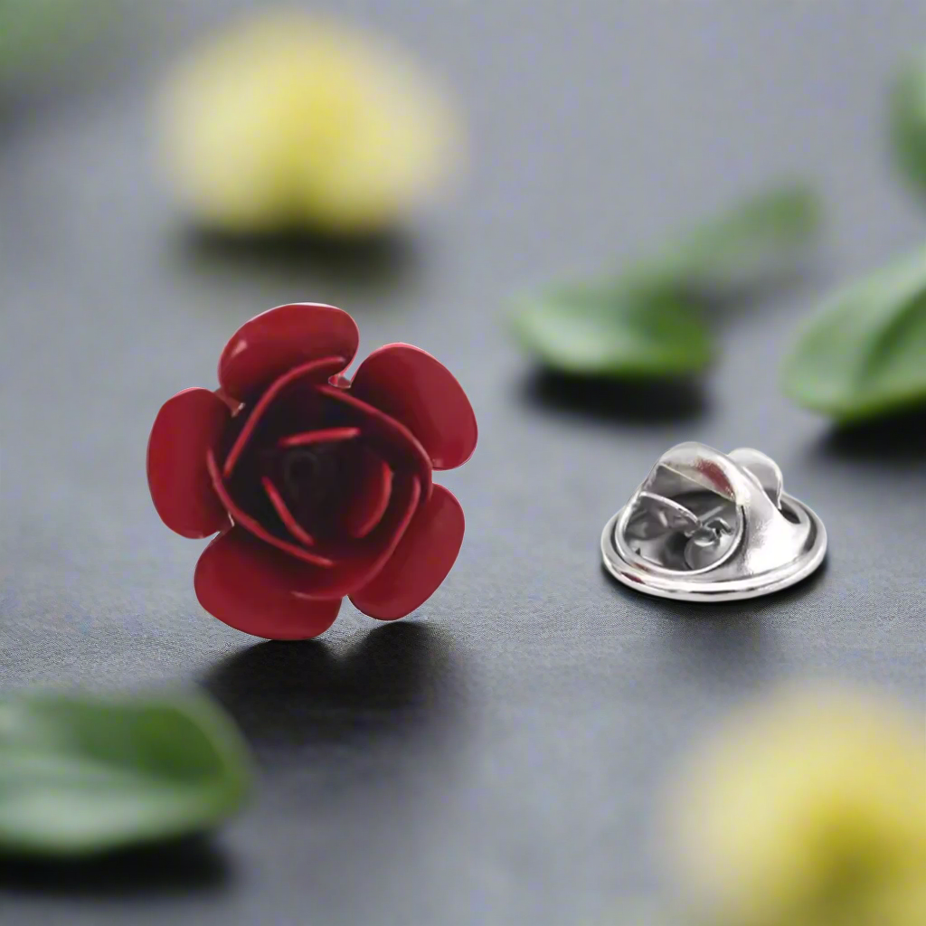 Close-up of the elegant red rose lapel pin showcasing its intricate design.