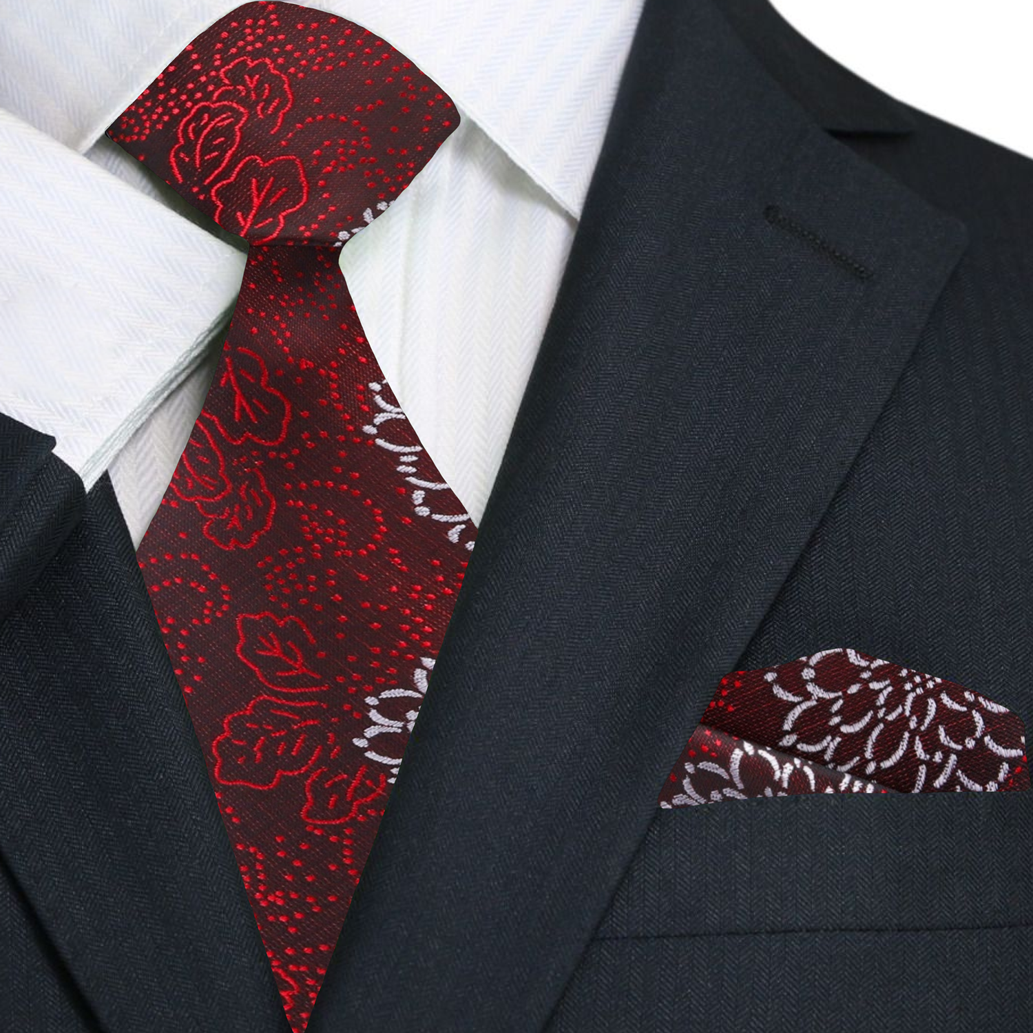 Close-up of the red tie showcasing intricate Zinnia flowers.