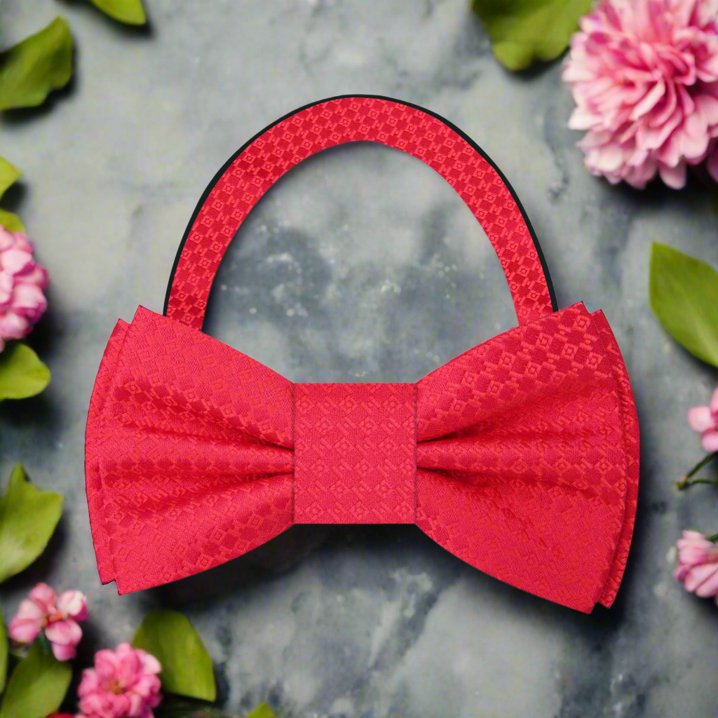 Detail shot of textured pattern on the red bow tie for mens formal wear
